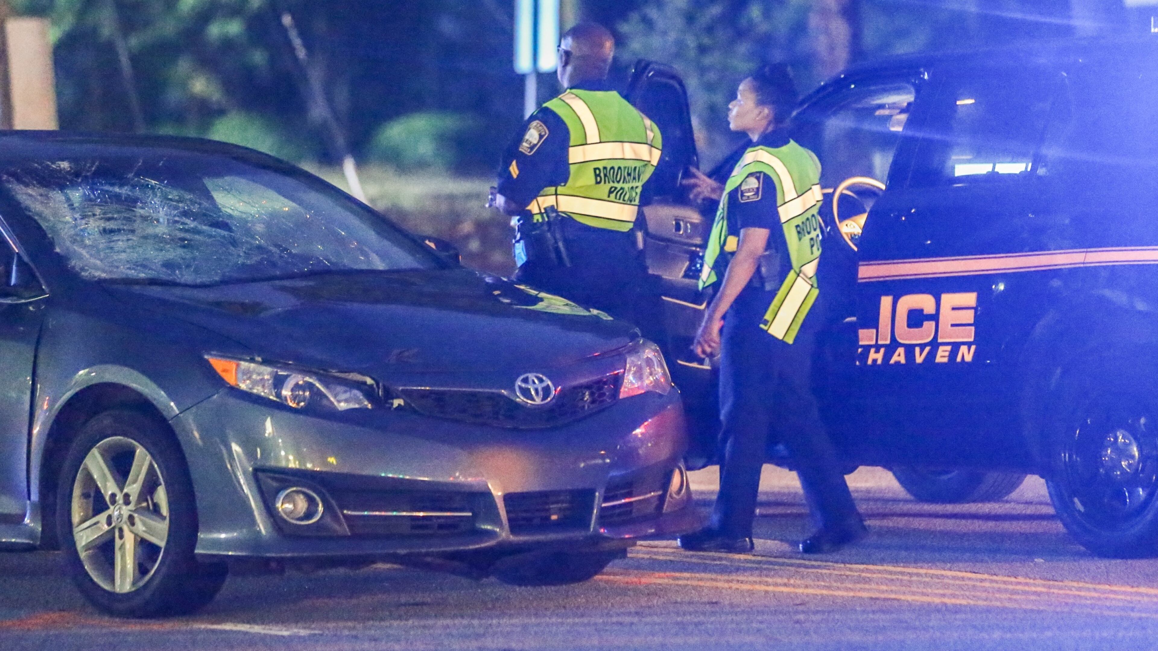 North Druid Hills Road was shut down for more than an hour while Brookhaven police and the Georgia State Patrol investigated a pedestrian accident. JOHN SPINK / JSPINK@AJC.COM