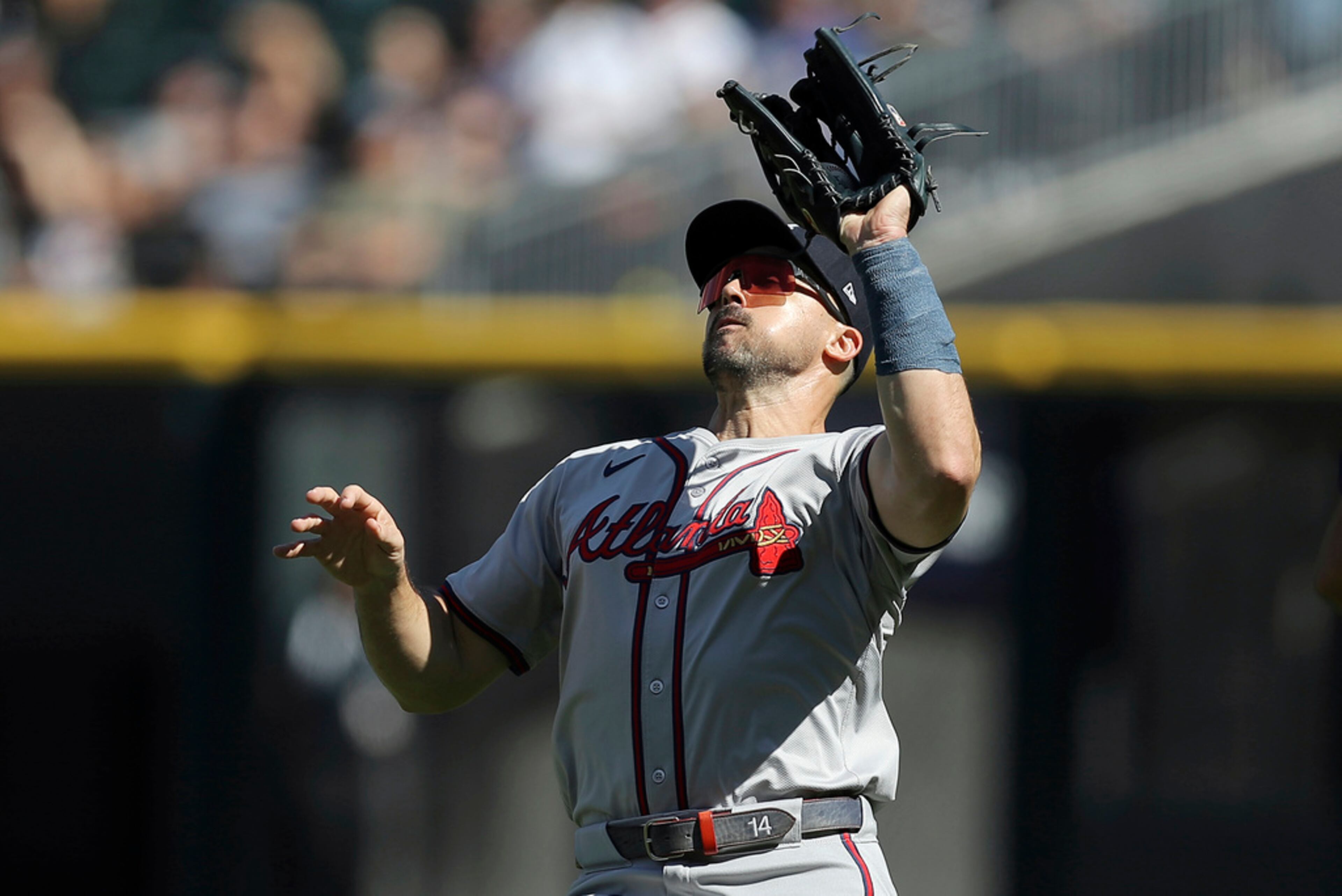 Atlanta Braves' Adam Duvall makes a catch for an out during the third inning of a baseball game against the Chicago White Sox, Thursday, June 27, 2024, in Chicago. (AP Photo/Melissa Tamez)