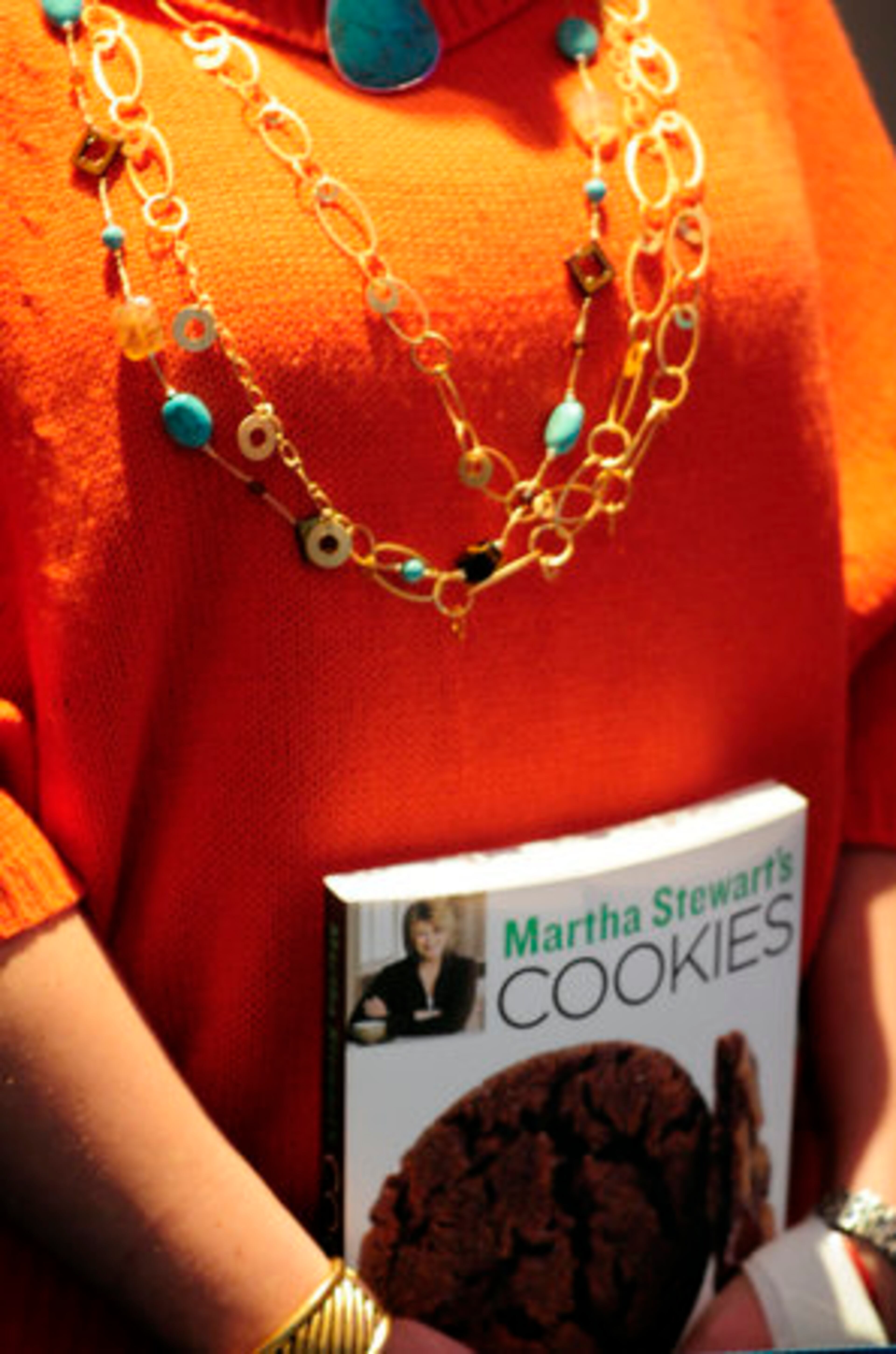 A fan holds a copy of "Martha Stewart's Cookies."
