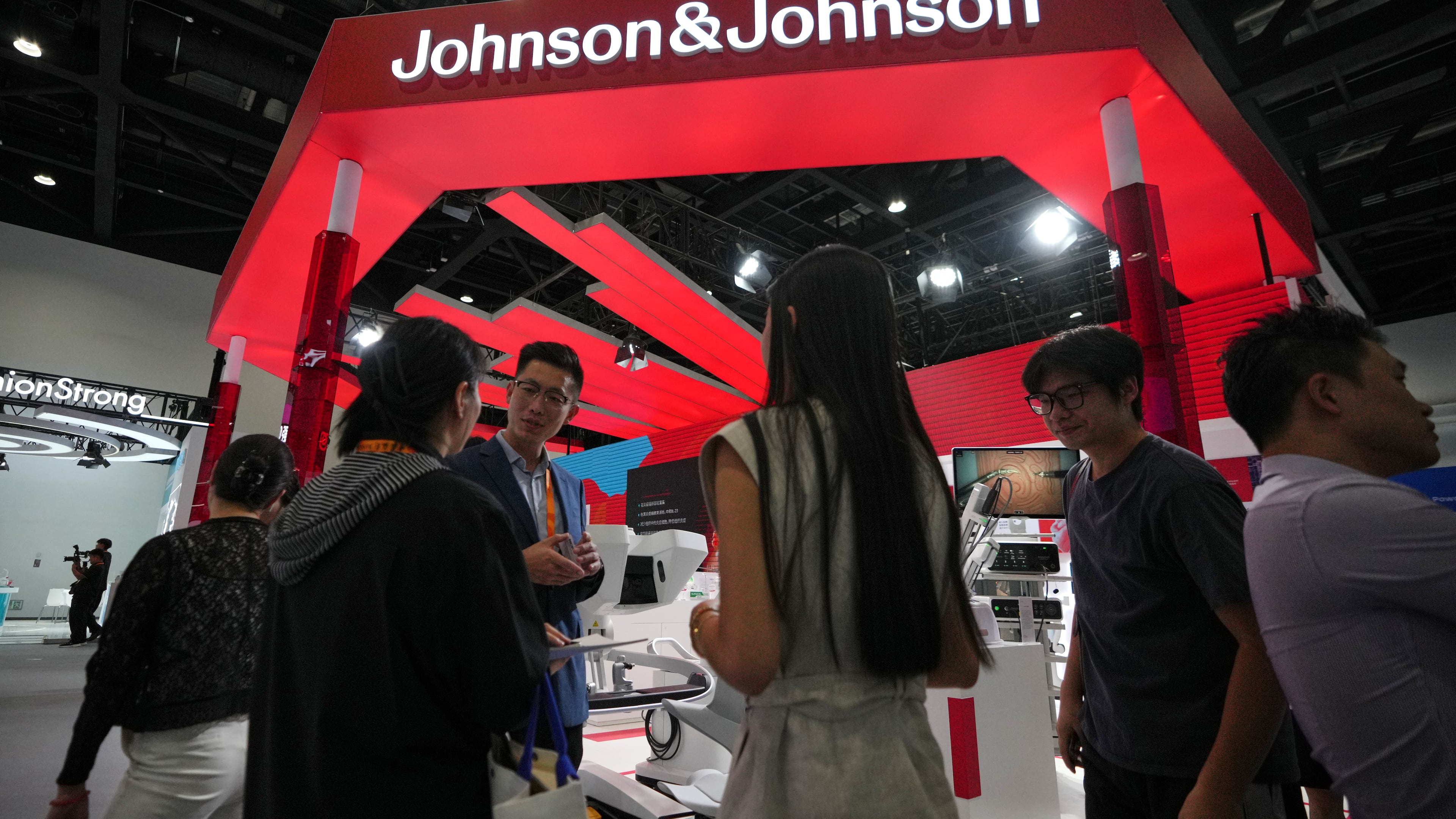 Visitors tour a Johnson & Johnson's booth promoting medical machines at the medical service sector for China International Fair for Trade in Services (CIFTIS) at the Shougang venue in Beijing, Wednesday, Sept. 9, 2026. (AP Photo/Andy Wong)