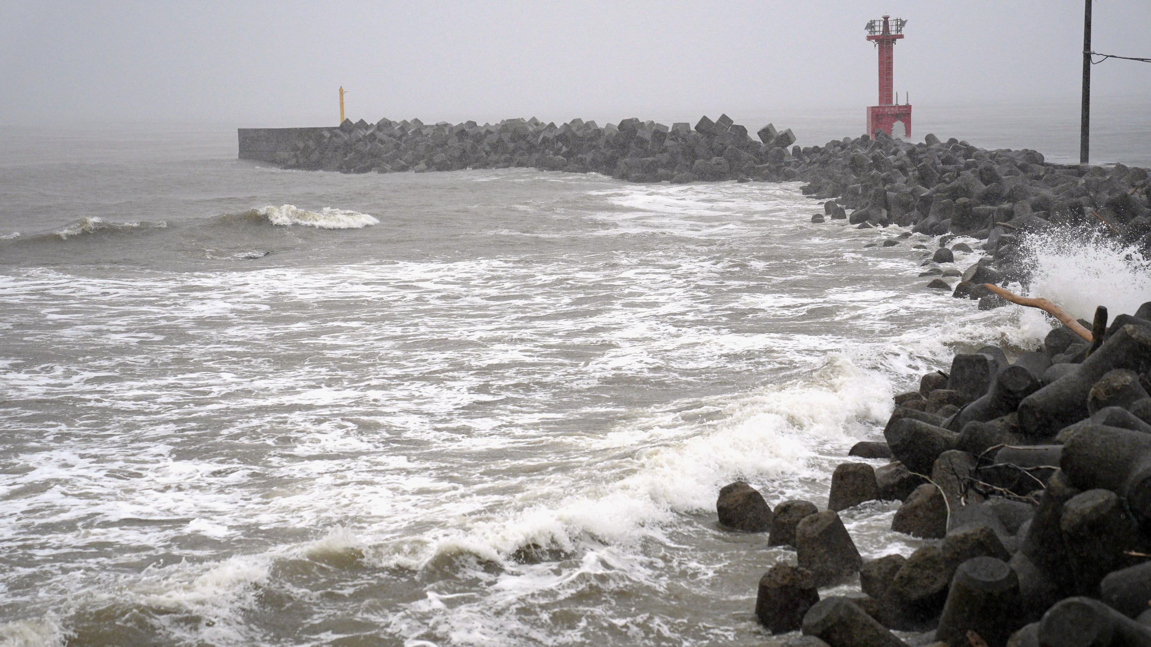 A coastline is hit by high waves as a typhoon approaches Futtsu city, Chiba prefecture near Tokyo, Saturday, June 27, 2026. (Kyodo News via AP)