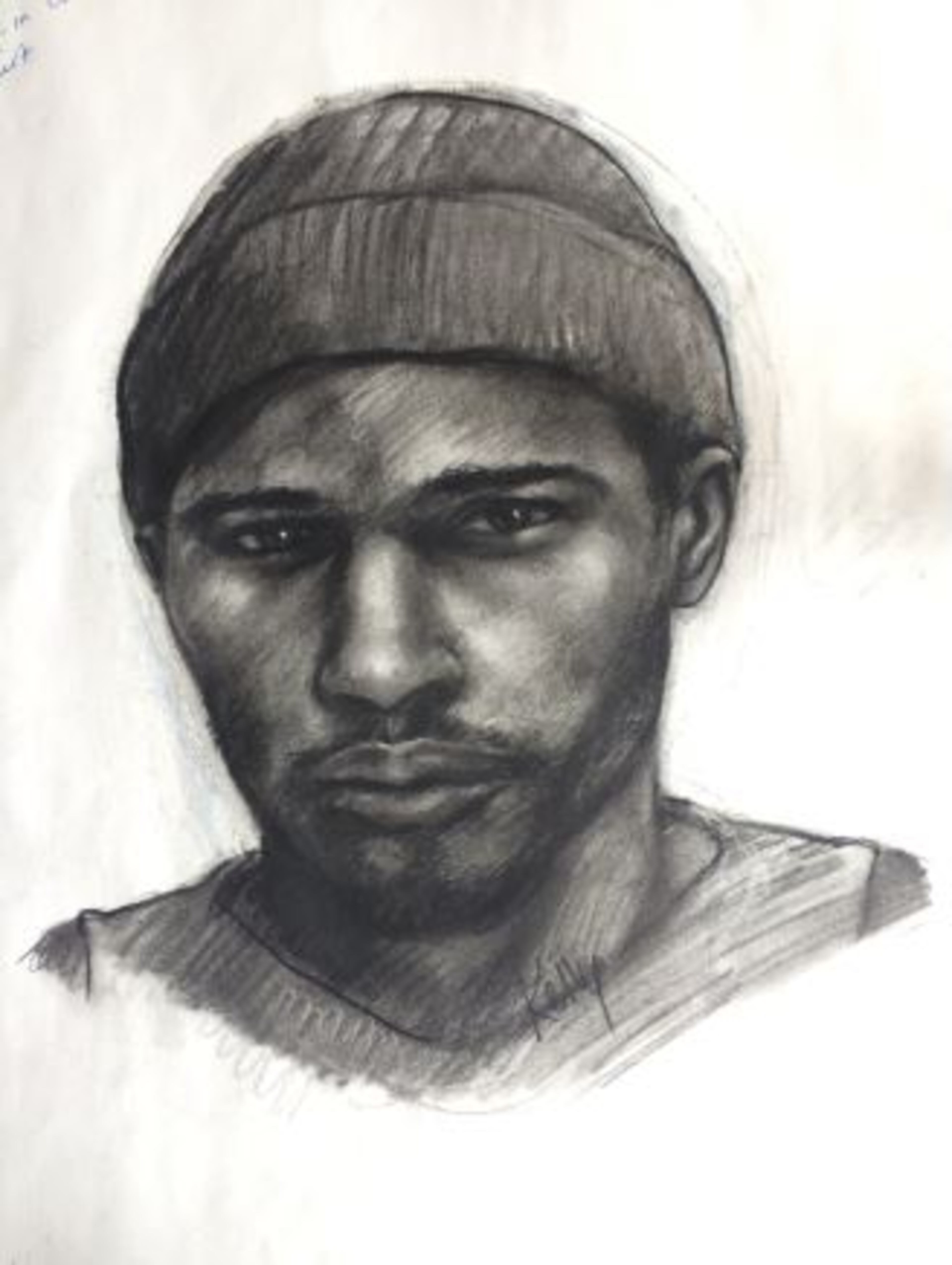 Woodstock police have released a GBI sketch of one of the suspects in Wednesday night’s deadly armed robbery of a smoke shop. Store clerk Enrique Delos-Reyes, 20, of Woodstock, was shot during the robbery of the Smoke 99 shop in the 800 block of Ga. 92. After the robbery, the two suspects fled in a gray, four-door BMW sedan with a dealer drive-out tag.