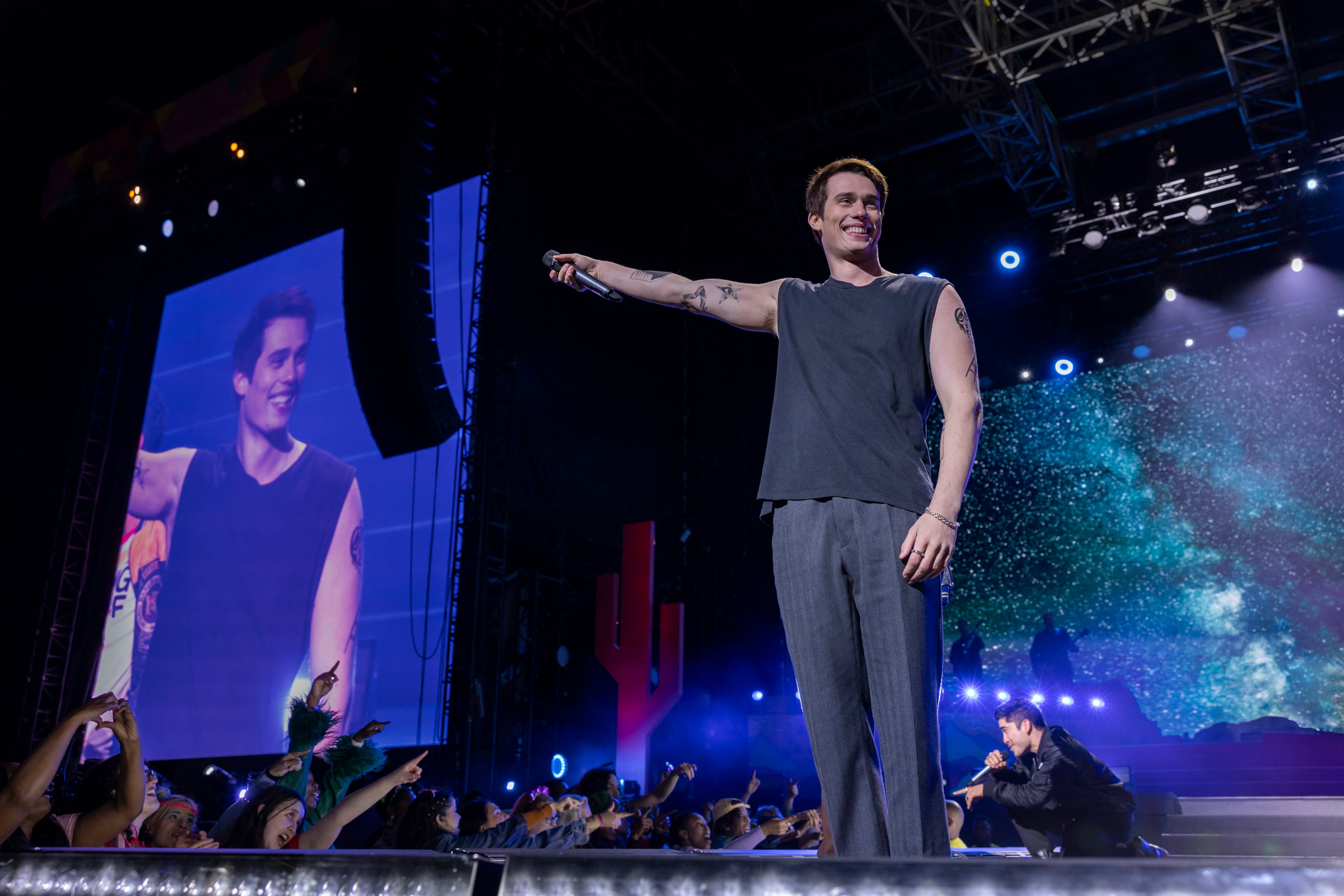 Nicholas Galitzine as Hayes Campbell with the fictional boy band August Moon in a scene from “The Idea of You.” (Alisha Wetherill/Prime Video/TNS)