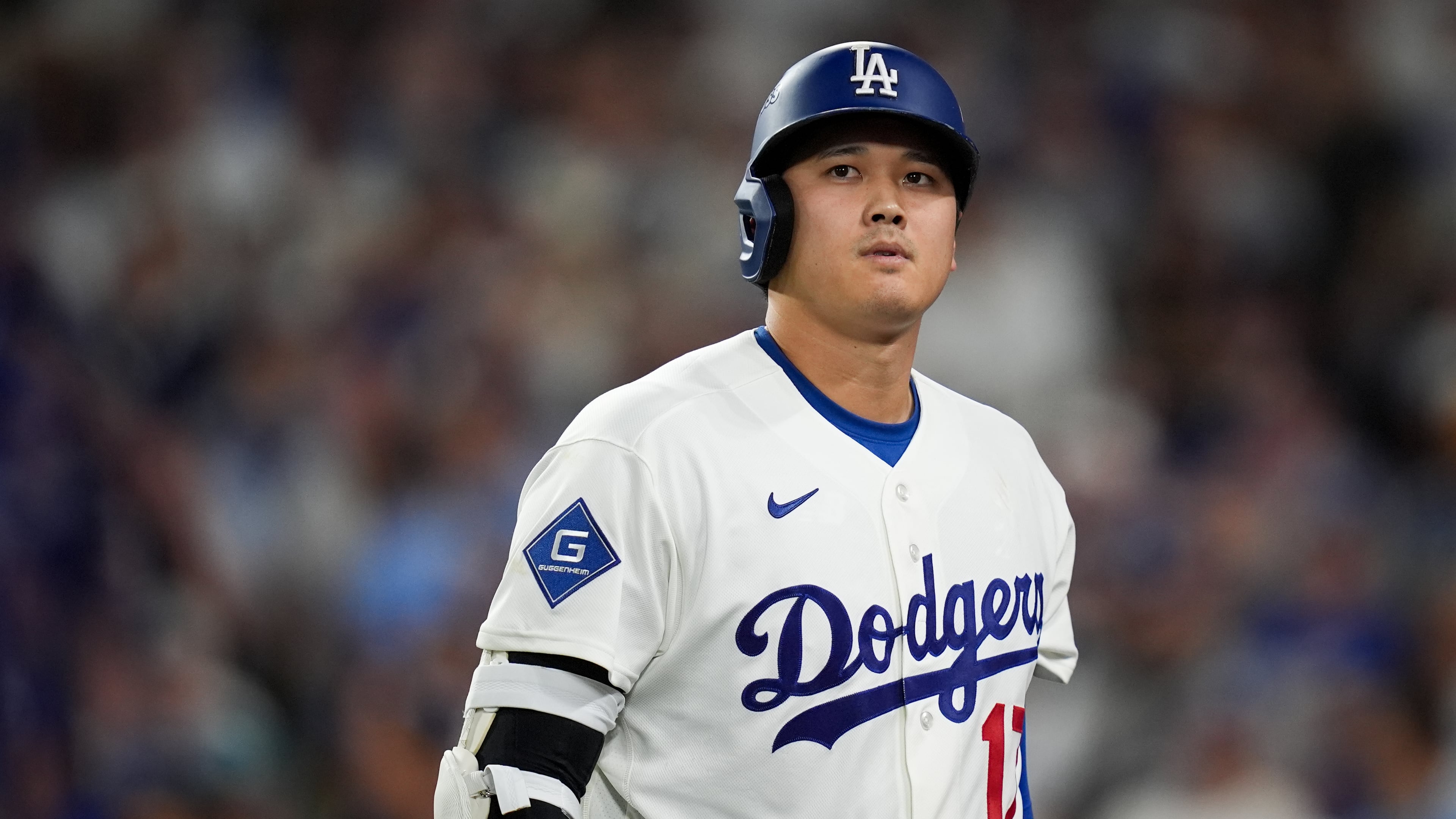 Los Angeles Dodgers designated hitter Shohei Ohtani walks to the dugout after striking out during the seventh inning of Game 4 of baseball's National League Championship Series between the Milwaukee Brewers and the Los Angeles Dodgers, Thursday, Oct. 15, 2026, in Los Angeles. (AP Photo/Gregory Bull)