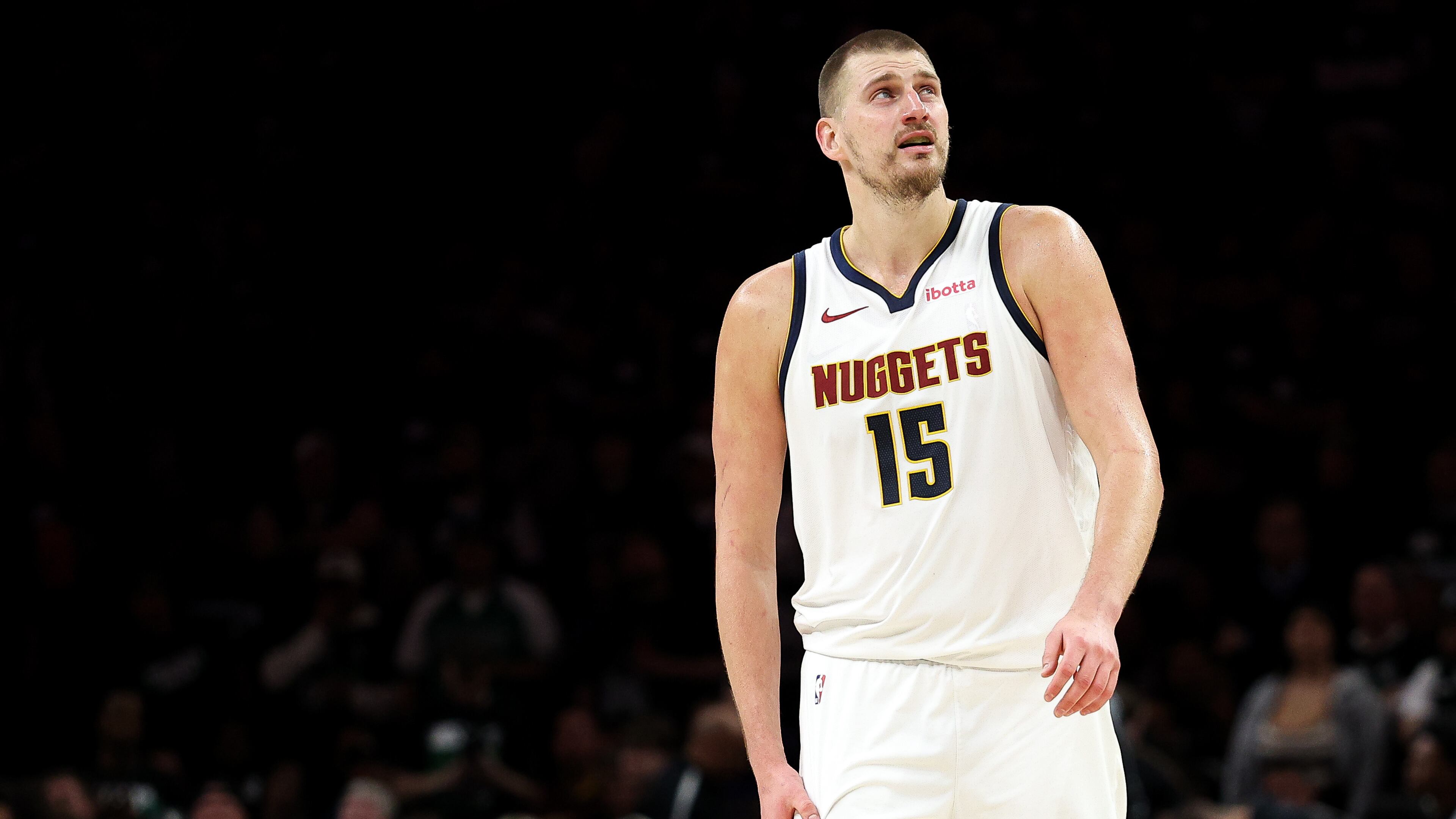 Denver Nuggets center Nikola Jokic (15) looks on during the second half of Game 6 of a first-round NBA basketball playoffs series against the Minnesota Timberwolves, Thursday, April 30, 2026, in Minneapolis. (AP Photo/Matt Krohn)