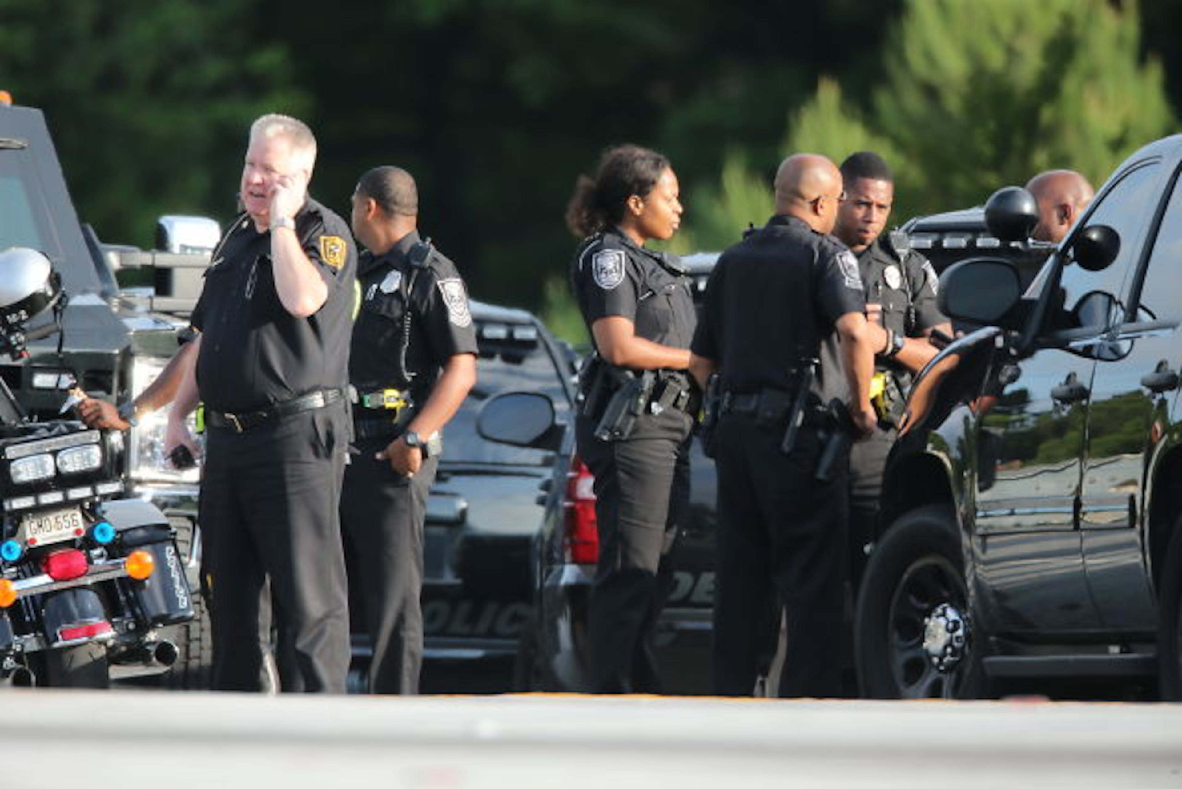 DeKalb police SWAT officers were called to a Motel 6 on Lawrenceville Highway and Montreal Road after a man inside refused to come out Wed., June 3, 2015. JOHN SPINK / JSPINK@AJC.COM
