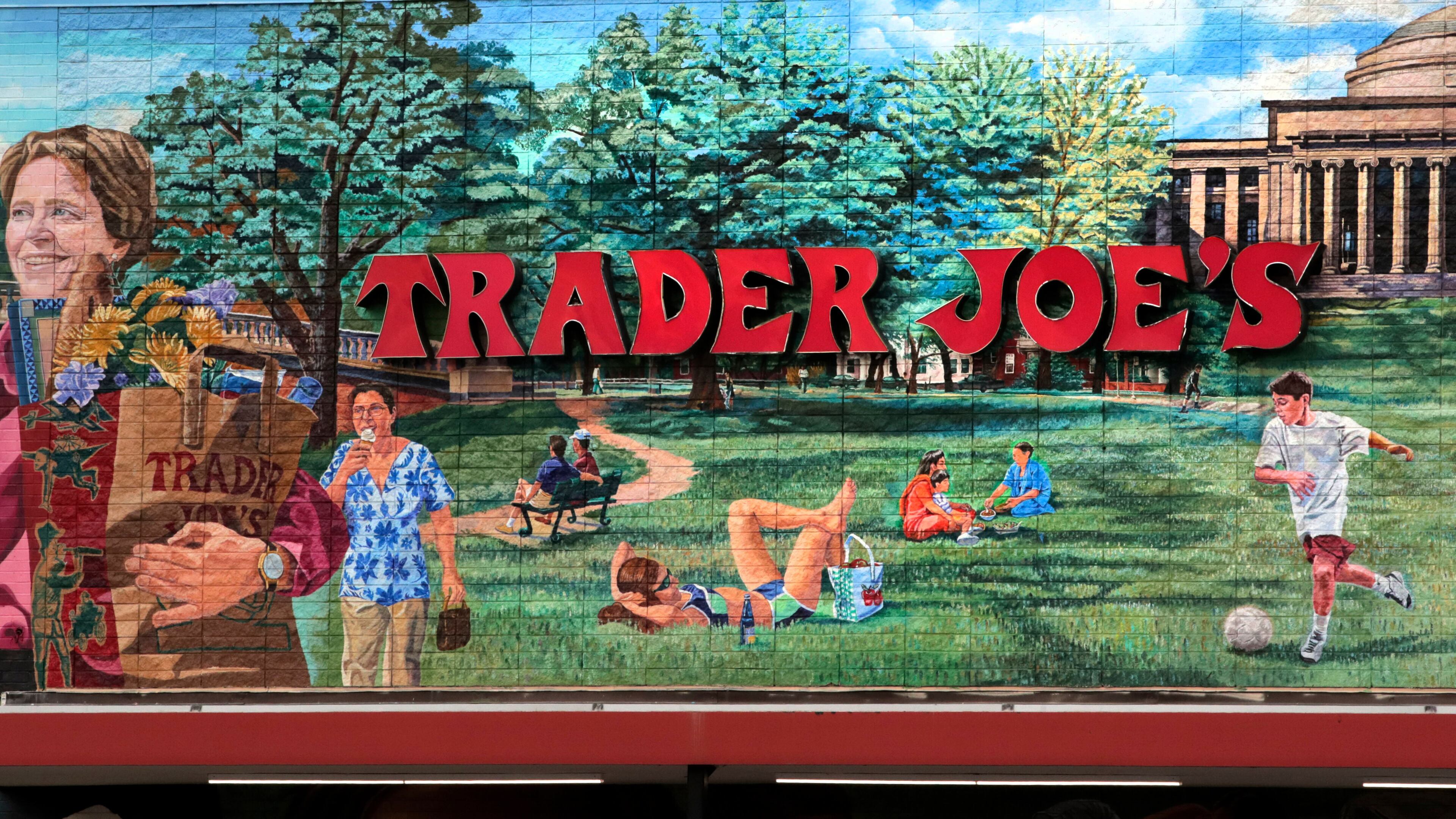 FILE - The Trader Joe's logo hangs on a mural, Aug. 13, 2019, in Cambridge, Mass. (AP Photo/Charles Krupa, File)