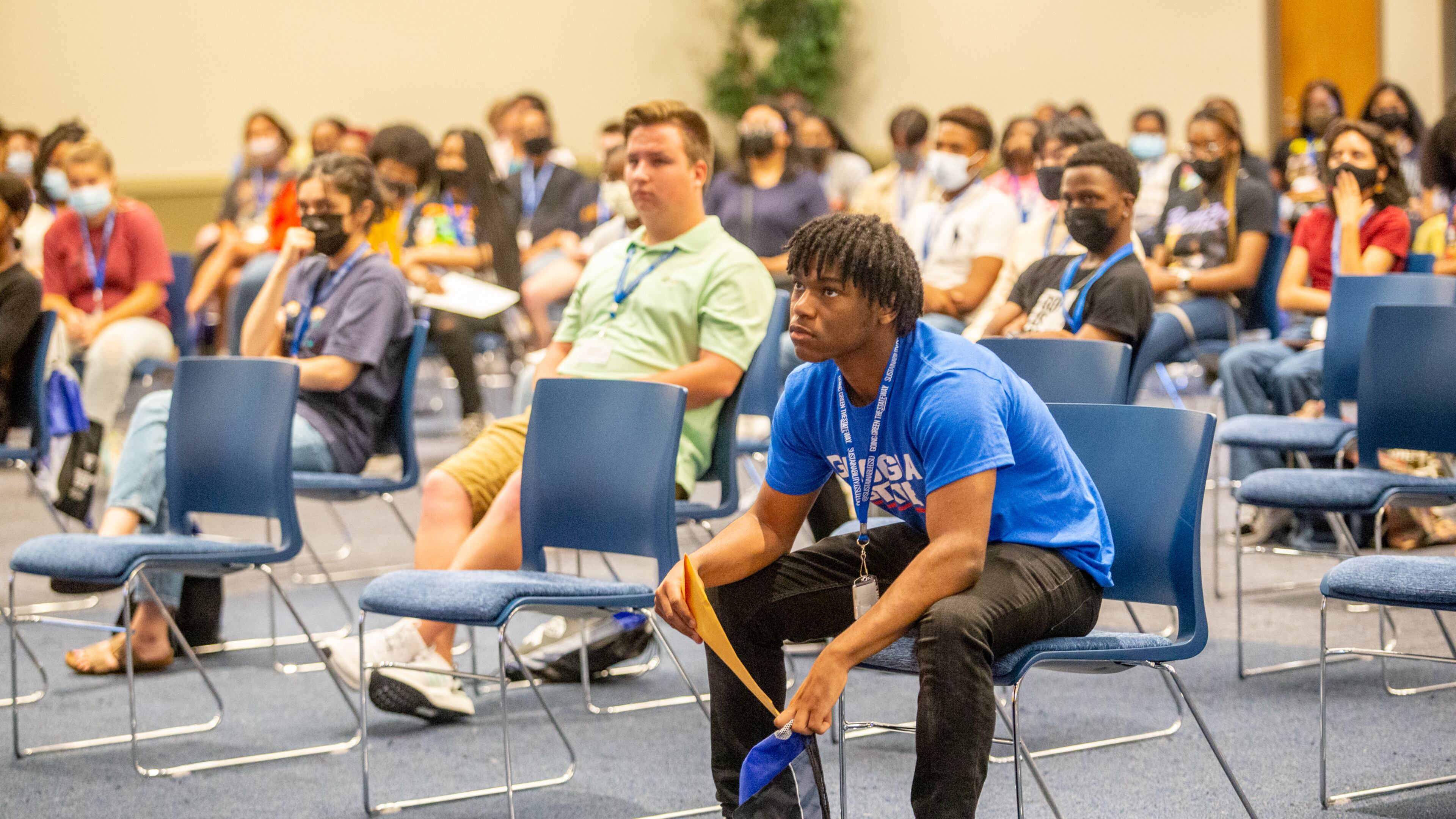 Georgia State University holds orientation where Ajani Gervais gets ready to take a tour of campus with more than 150 other incoming students Wednesday, June 23, 2021. Parents and students are presented with school standards and matched with student orientation leaders for group tours of the campus. Students move to campus in August. (Jenni Girtman for The Atlanta Journal-Constitution)