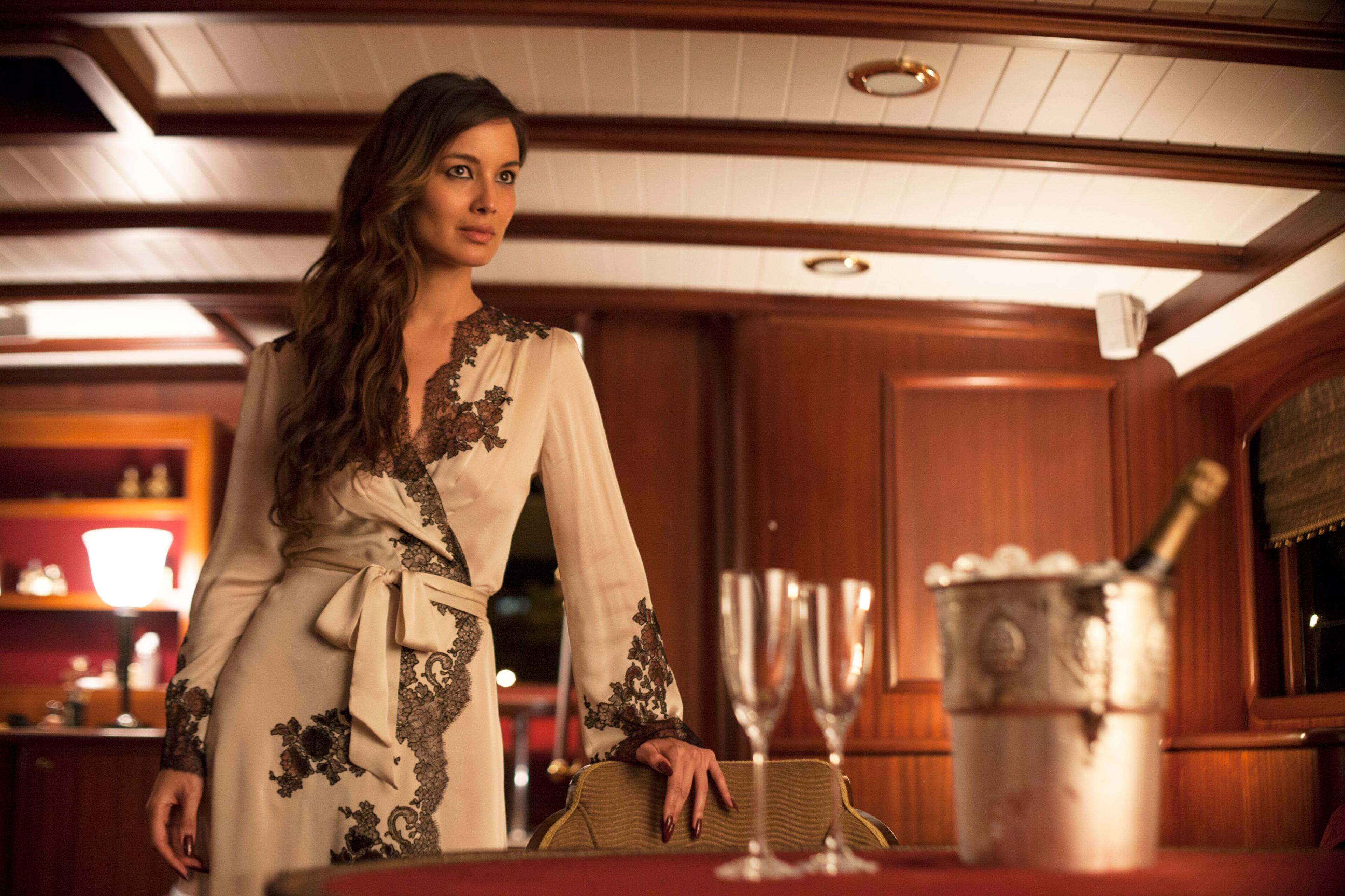 This film image released by Sony Pictures shows Berenice Marlohe in a scene from the film "Skyfall." "I didn't follow fashion, I followed the script. But I know these characters, and I know what he or she would wear and why. I really tried to ask, 'What would that character really buy?'" costume designer Jany Temime said.