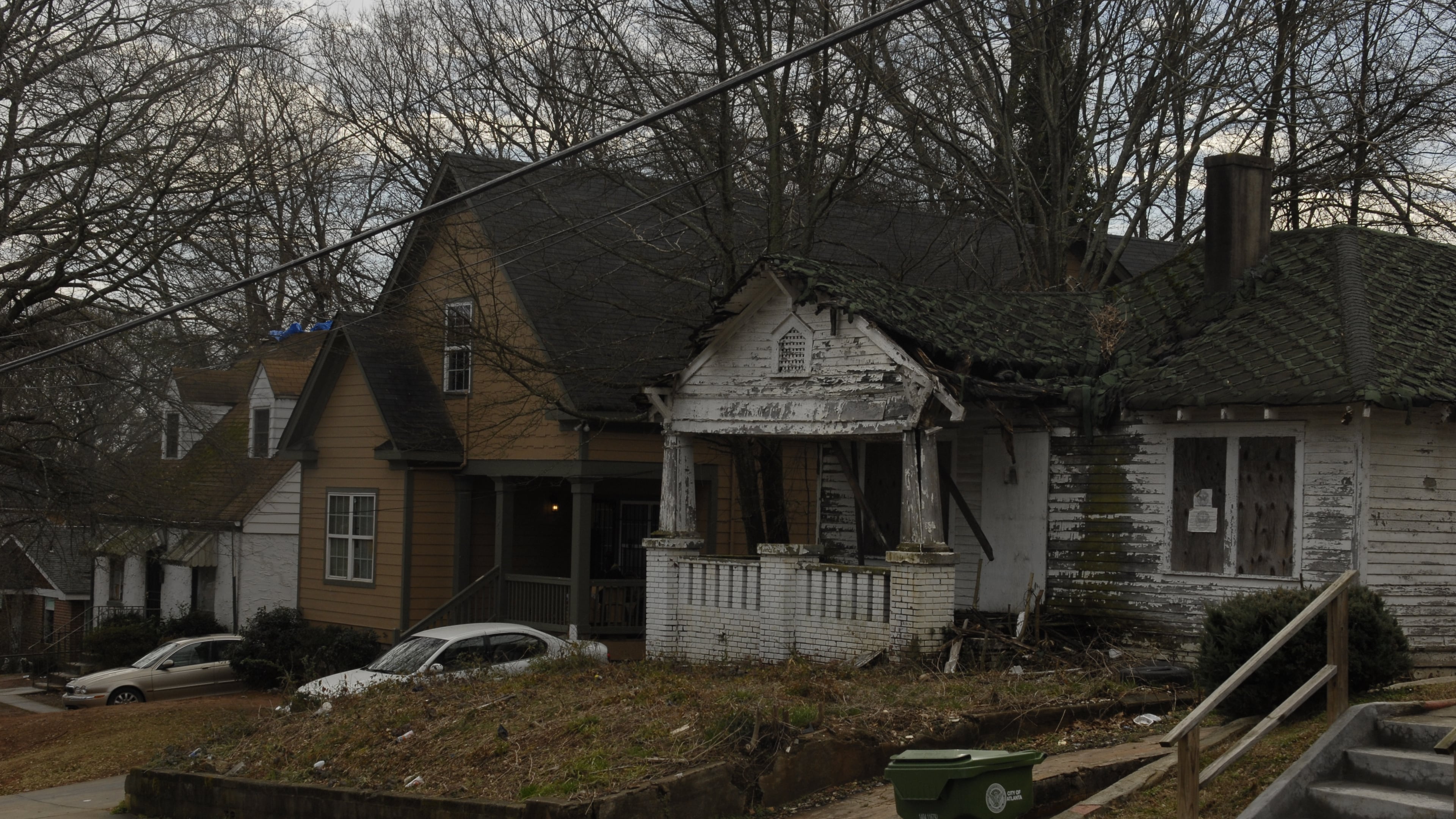 This AJC file photo from March 2015 shows abandoned and broken-down houses situated next to well-maintained family homes in Atlanta's Pittsburgh community. The 2008-2010 subprime mortgage fraud crisis left nearly half the homes vacant in the Pittsburgh neighborhood. Pittsburgh homeowners, Invest Atlanta, the Annie E. Casey Foundation and Wells Fargo are working to revitalize Pittsburgh. (Photo by J. Scott Trubey / strubey@ajc.com)