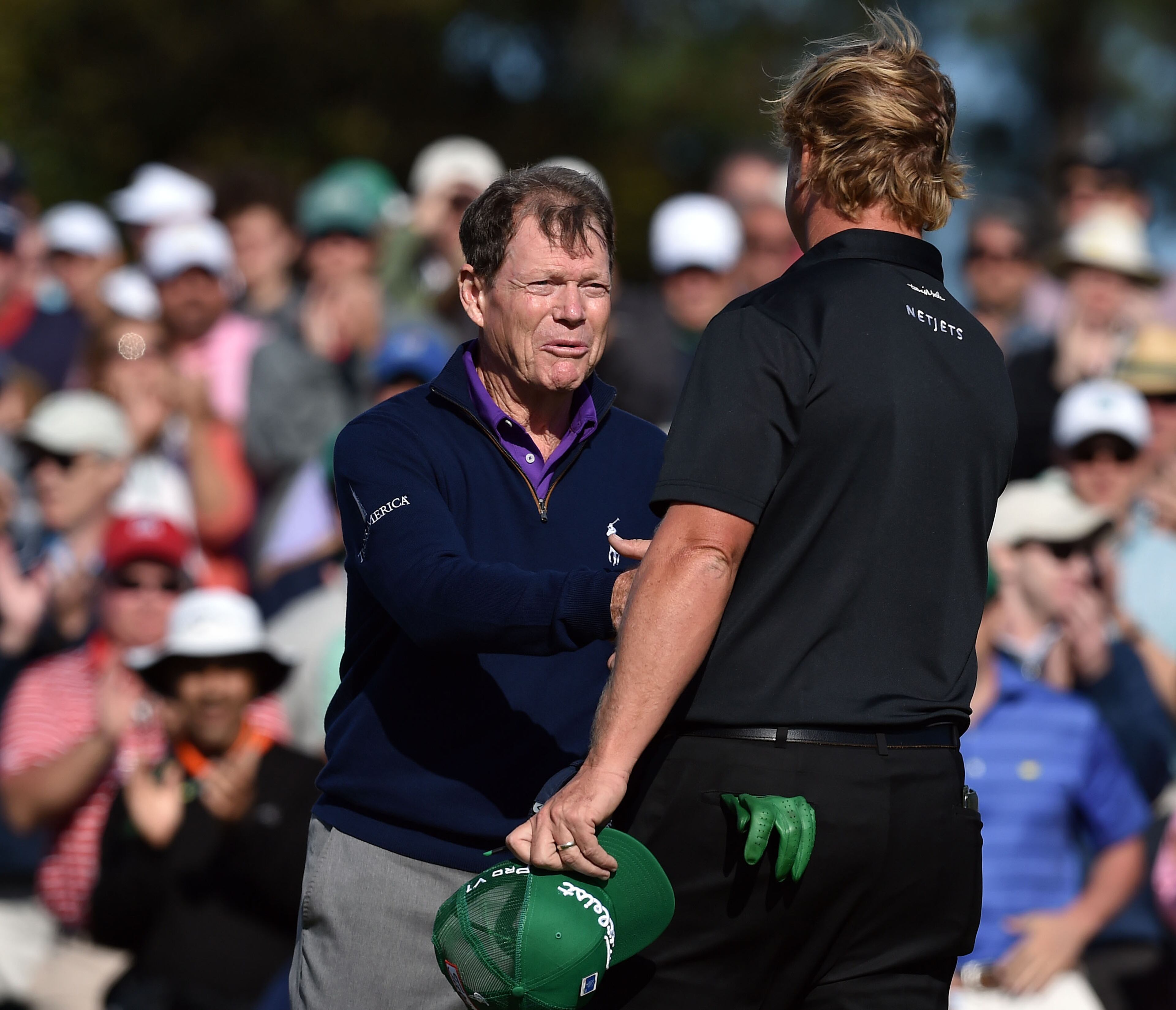 Tom Watson shakes hands with Charley Hoffman on the 18th green following his round during the 80th Masters at the Augusta National Golf Club, Friday, April 8, 2016. This is Watson's final Masters. Brant Sanderlin/bsanderlin@ajc.com