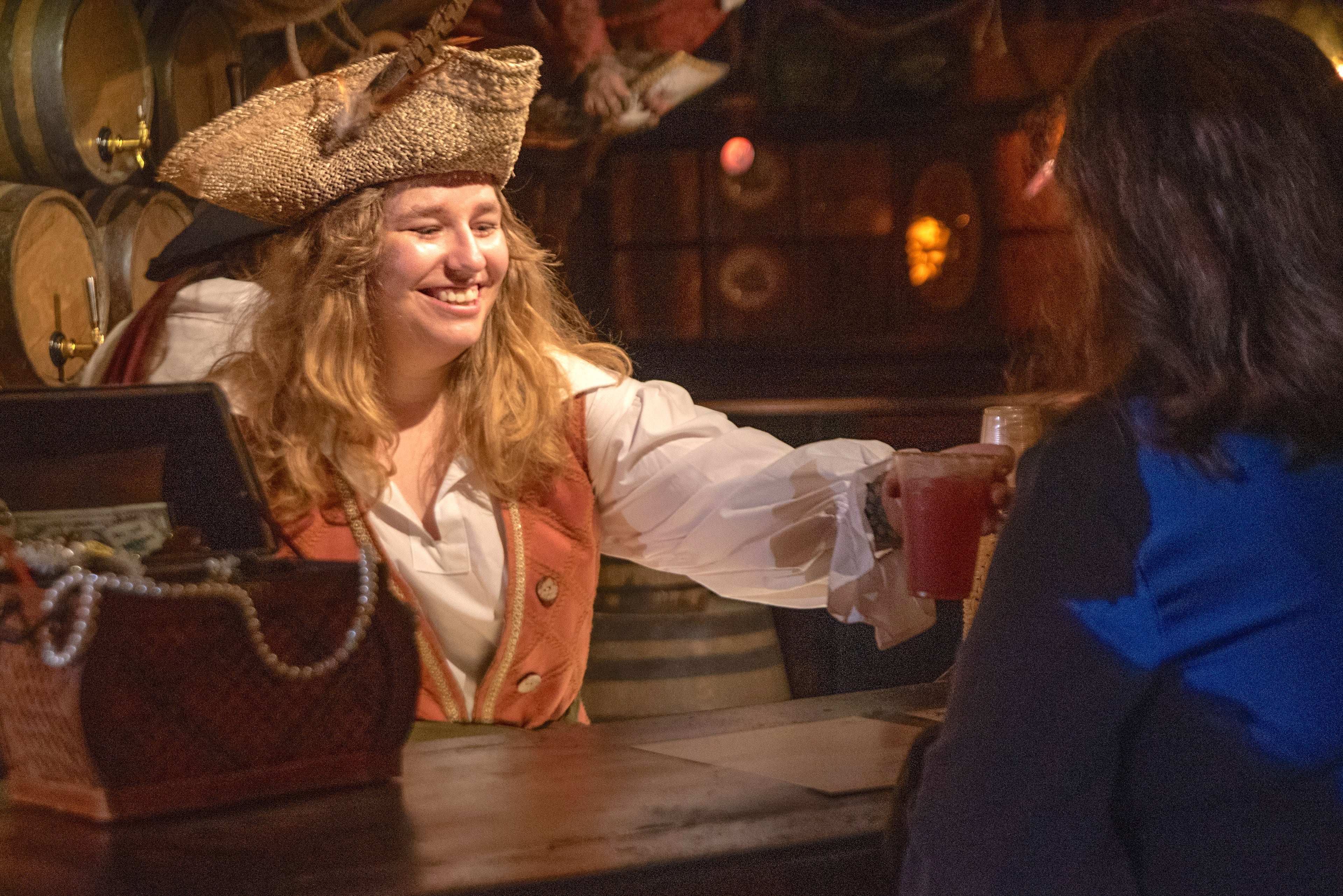 A visitor is served a drink in the tavern at the Savannah Pirates and Treasure Museum. (Courtesy of Travis Spagenhurg)