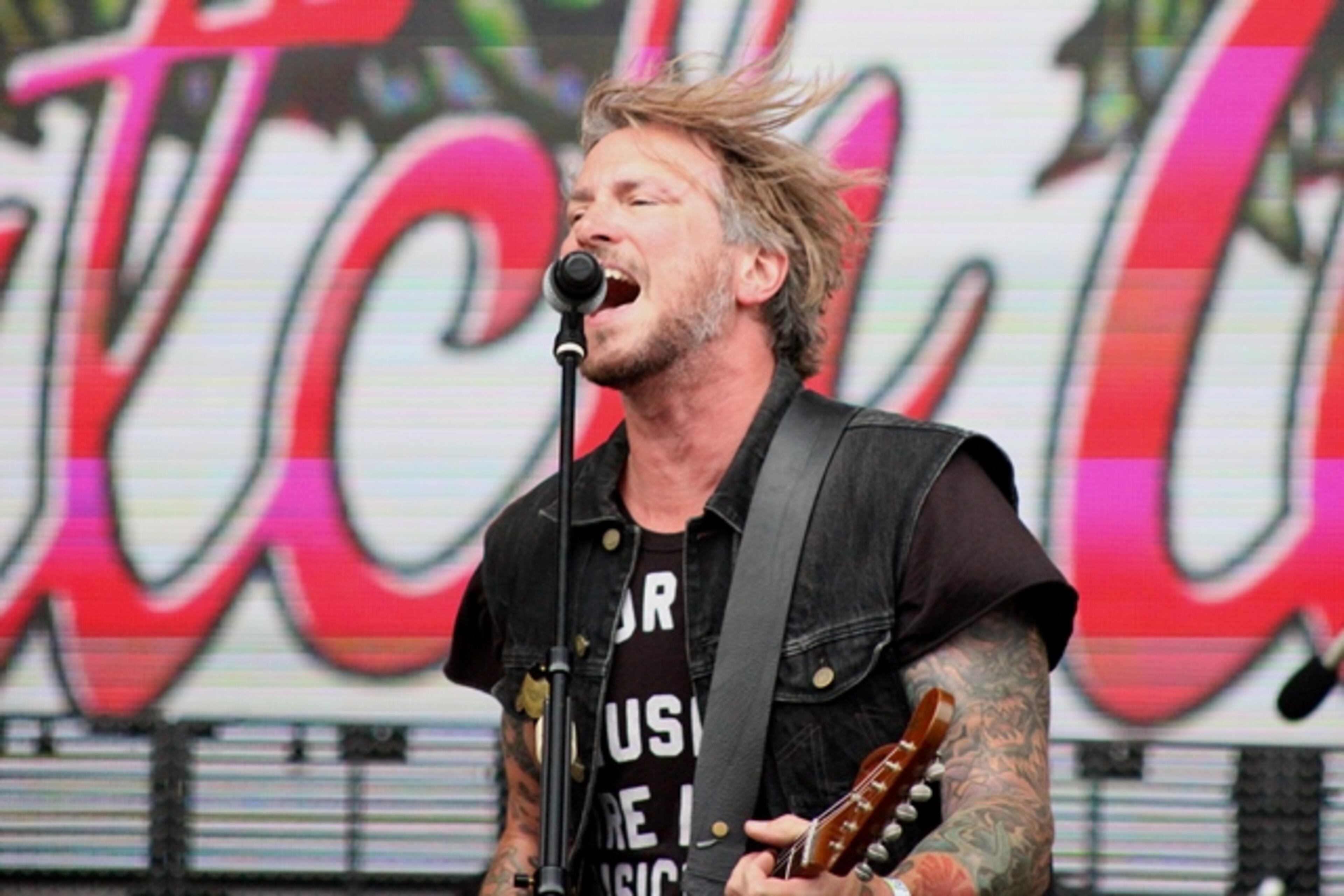 Butch Walker, a native of Rome, Ga., last played Music Midtown more than 20 years ago. He returned on Sept. 16, 2018 with a vigorous set of rockers. Photo: Melissa Ruggieri/AJC