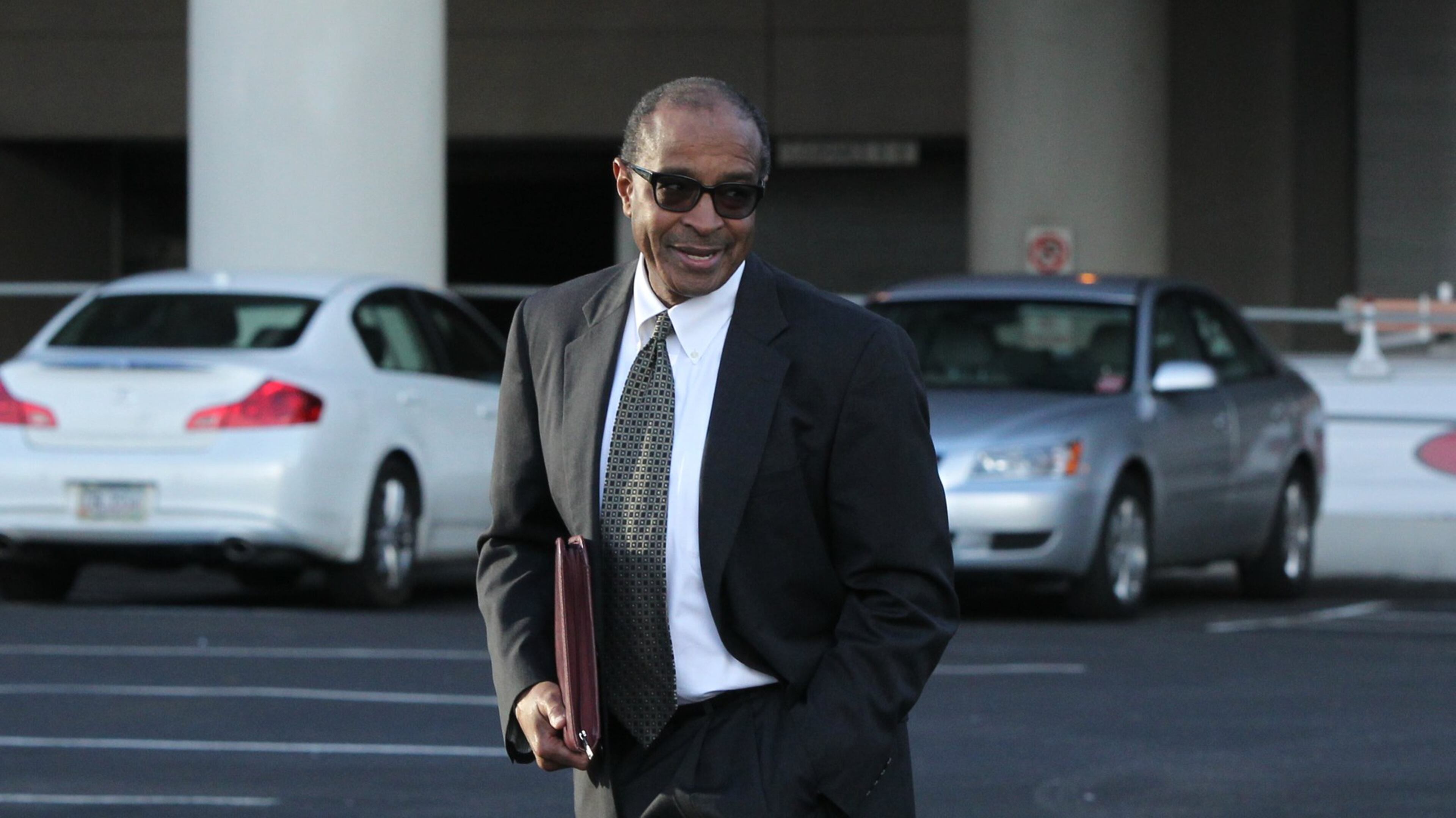 Elvin “E.R.” Mitchell Jr. returns to his car after pleading guilty in January in the Atlanta City Hall bribery investigation. (HENRY TAYLOR / HENRY.TAYLOR@AJC.COM)