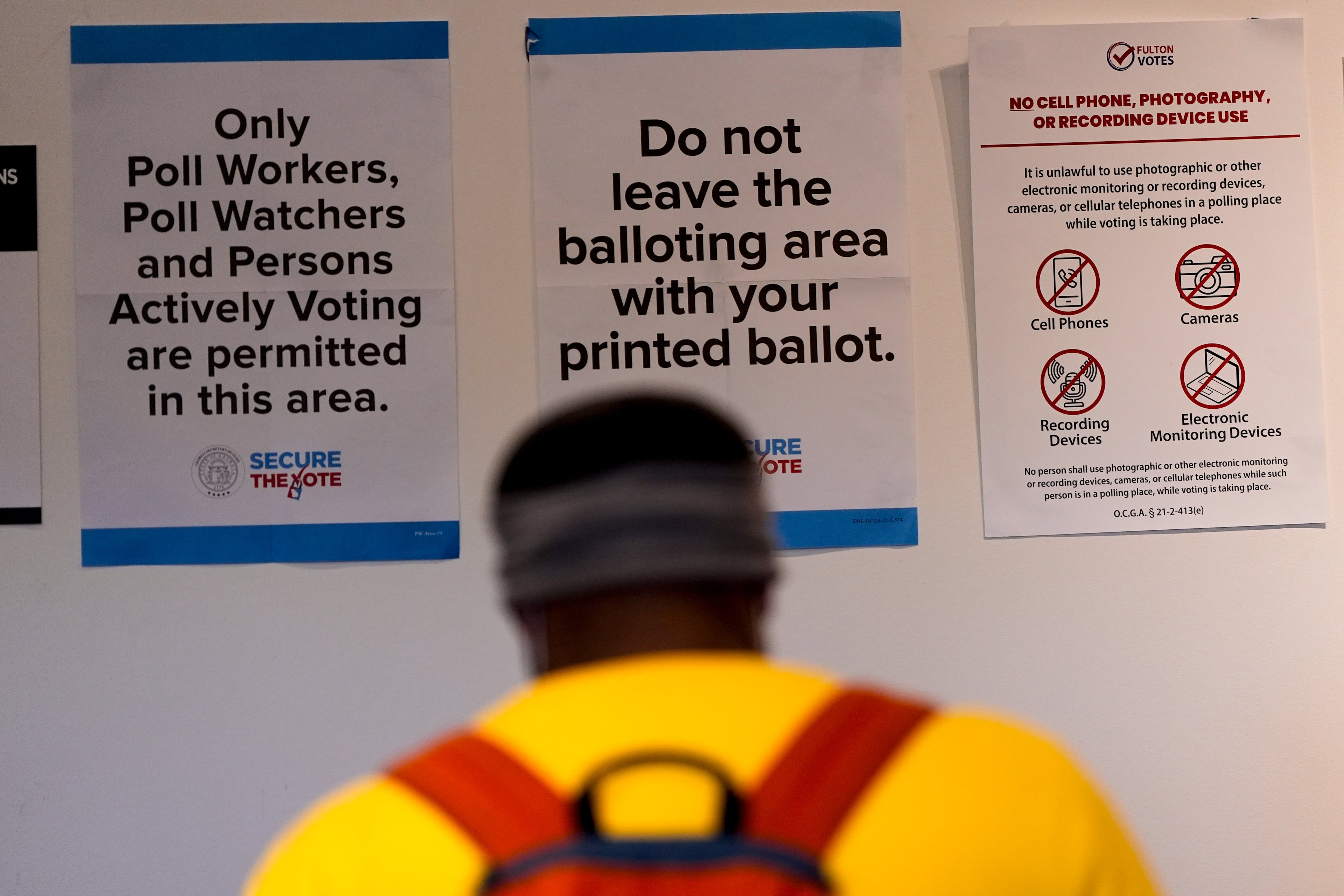 A man walks inside the The High Museum of Art voting center on the first day for early voting in Georgia, Tuesday, Oct. 13, 2026, in Atlanta. (Mike Stewart/AP)
