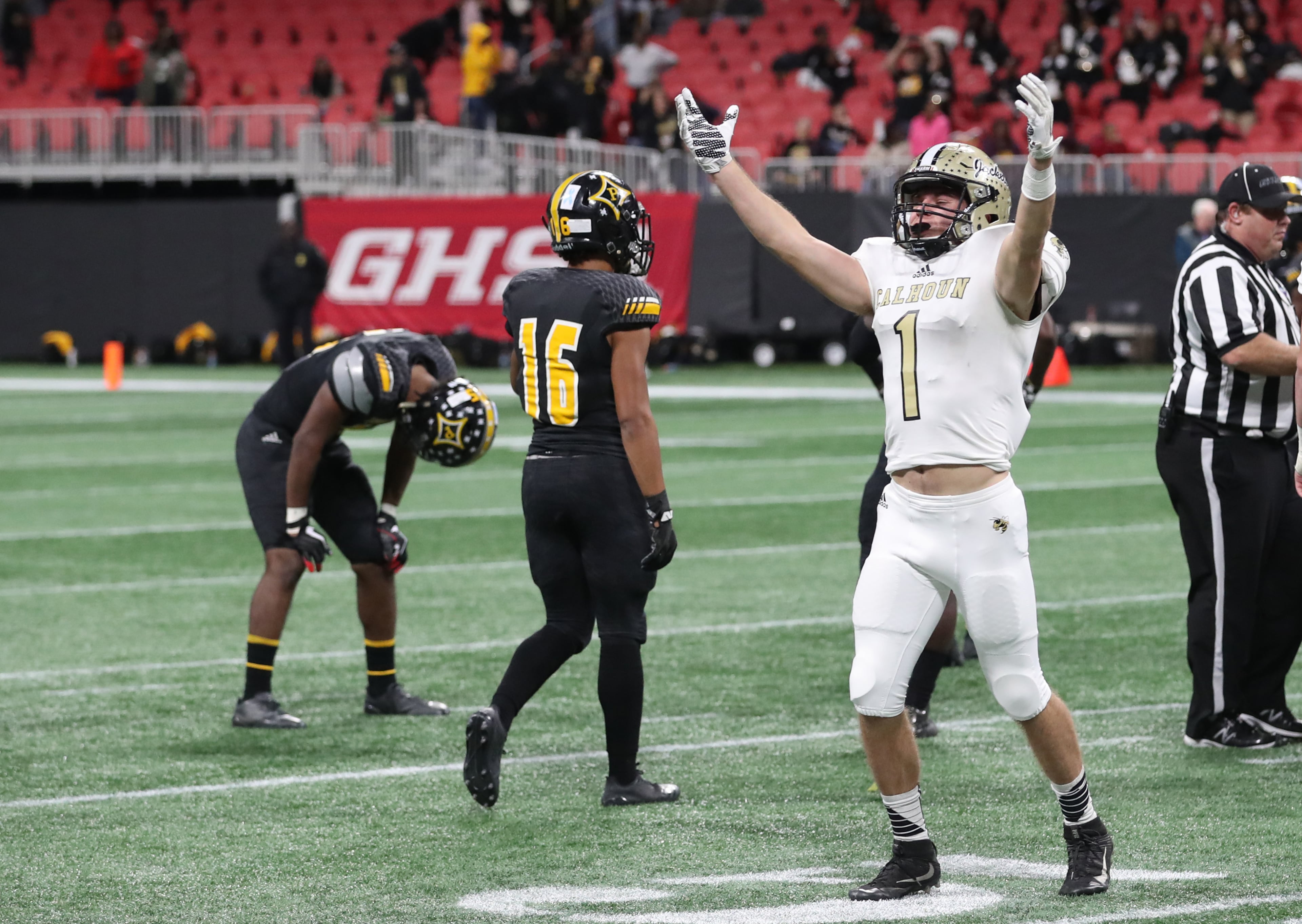 Calhoun wide receiver Porter Law (1) celebrates as time expires after their win against Peach County during the Class AAA Championship at Mercedes-Benz Stadium Friday, December 8, 2017, in Atlanta. Calhoun won 10-6. PHOTO / JASON GETZ