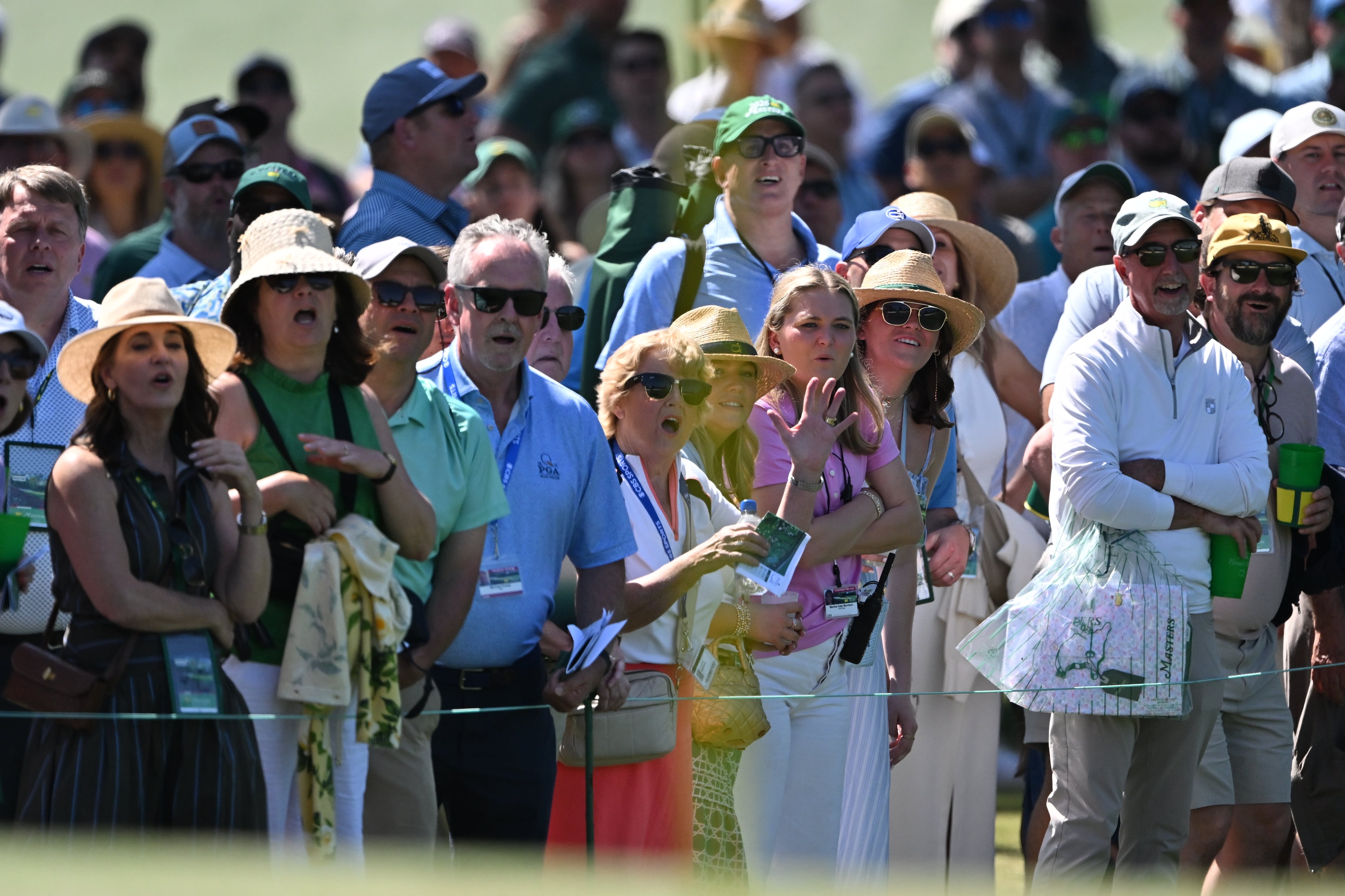 Patrons react to the action on the 7th hole during second round of the Masters, at Augusta National Golf Club, Friday, April 10, 2026, in Augusta, GA (Hyosub Shin/AJC)