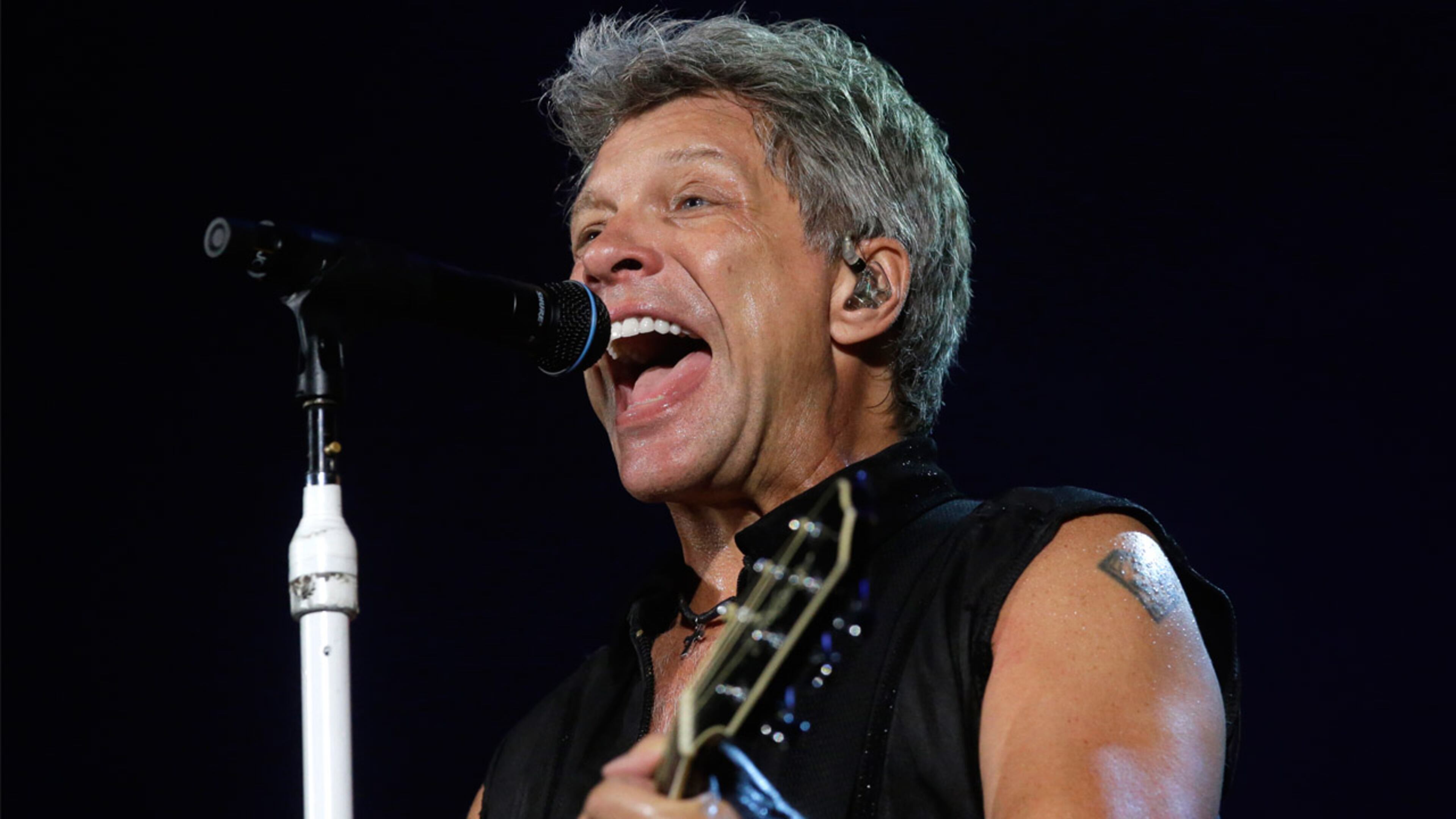 In this Sept. 11, 2015 file photo, Bon Jovi's lead singer Jon Bon Jovi performs during their "Bon Jovi Live!" concert at Gelora Bung Karno Stadium in Jakarta, Indonesia, on their Asia tour.