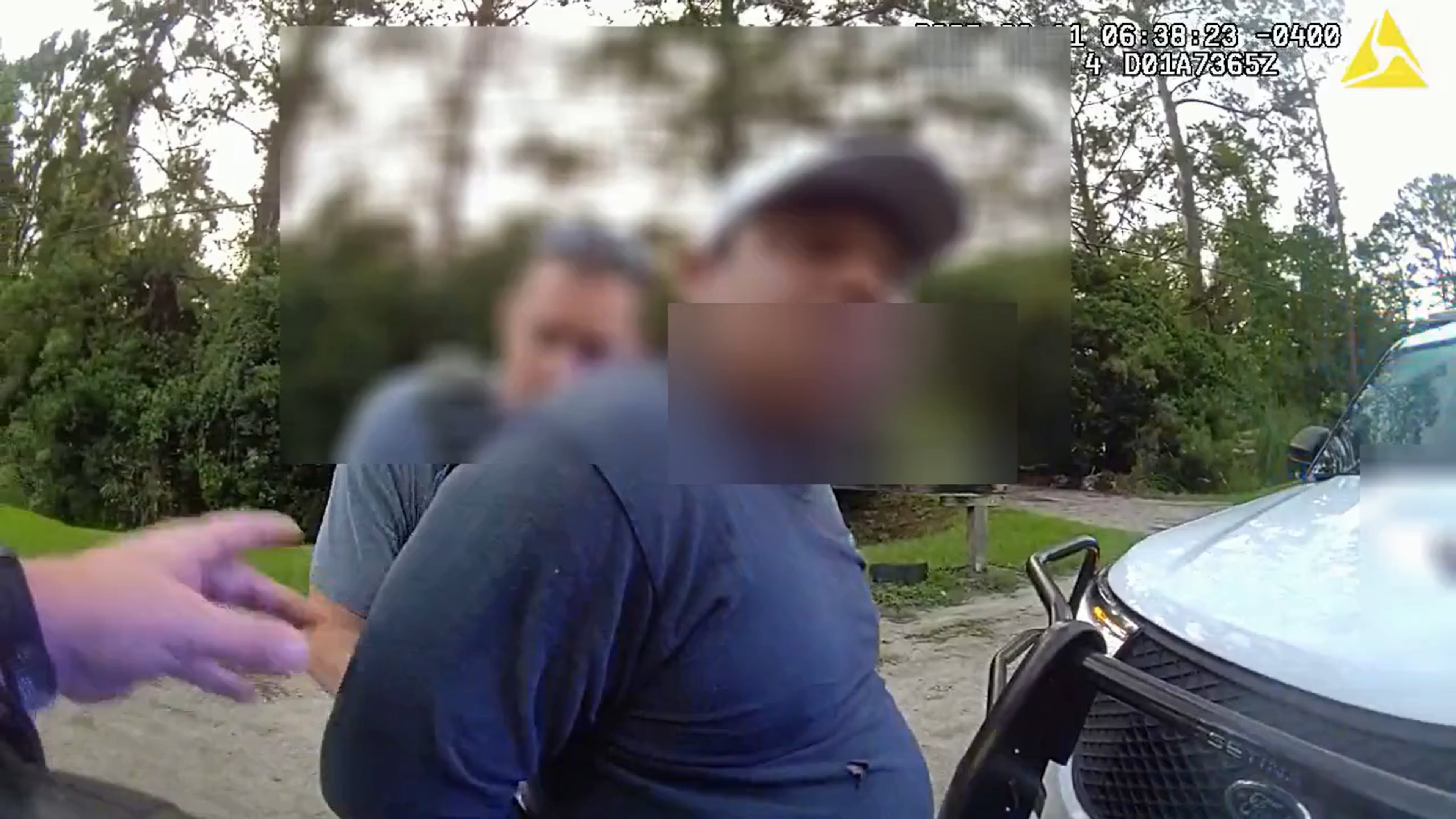 "I'm going to work," the driver of a landscaping company pickup truck repeatedly protested while getting handcuffed by an ICE agent in Savannah, Georgia, on June 11, 2025. (Chatham County Police Department)