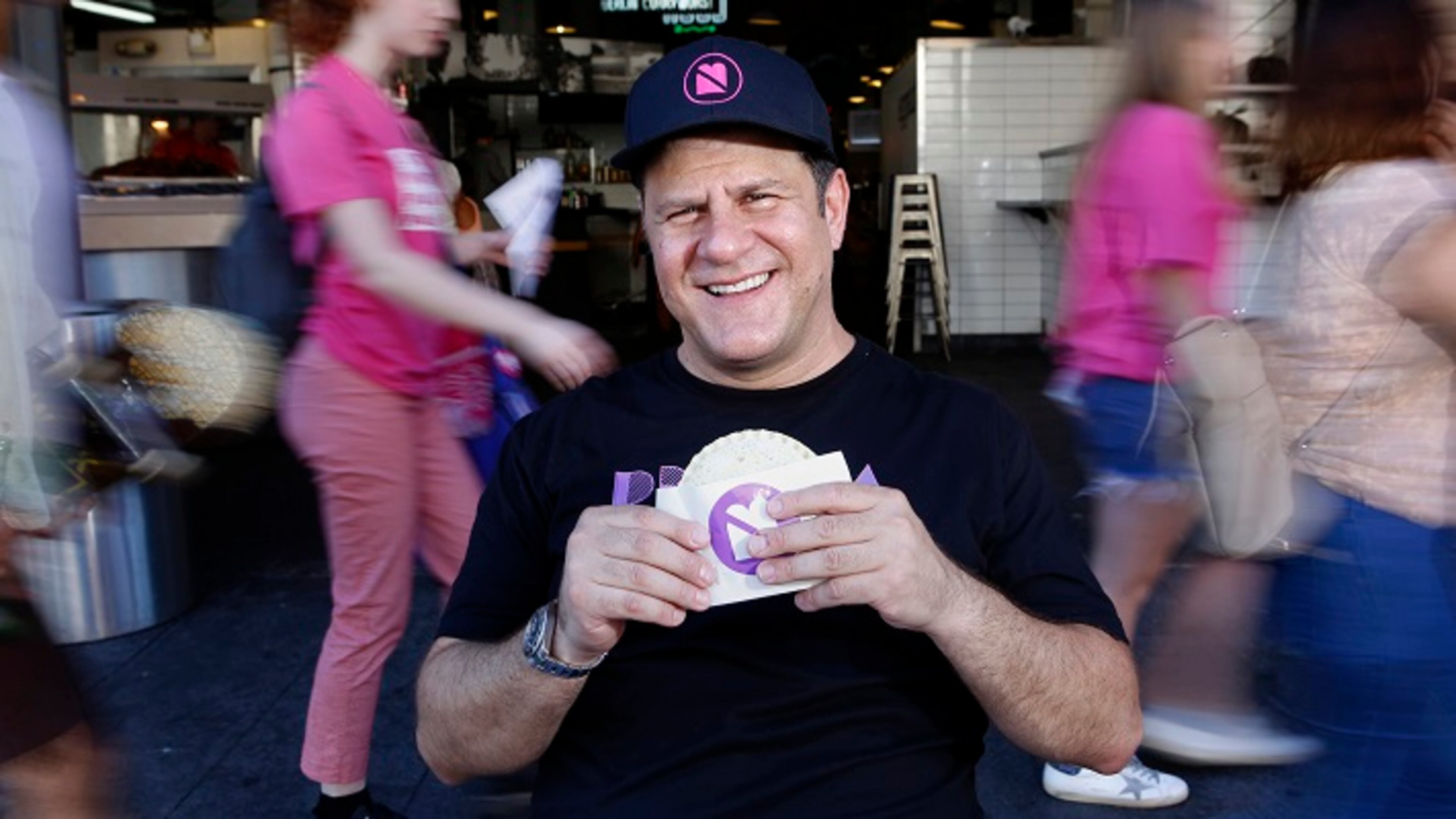 Umami Burger founder Adam Fleischman, with a peanut butter and jelly sandwich, at Grand Central Market in Los Angeles, Calif. (Christian K. Lee/Los Angeles Times/TNS)