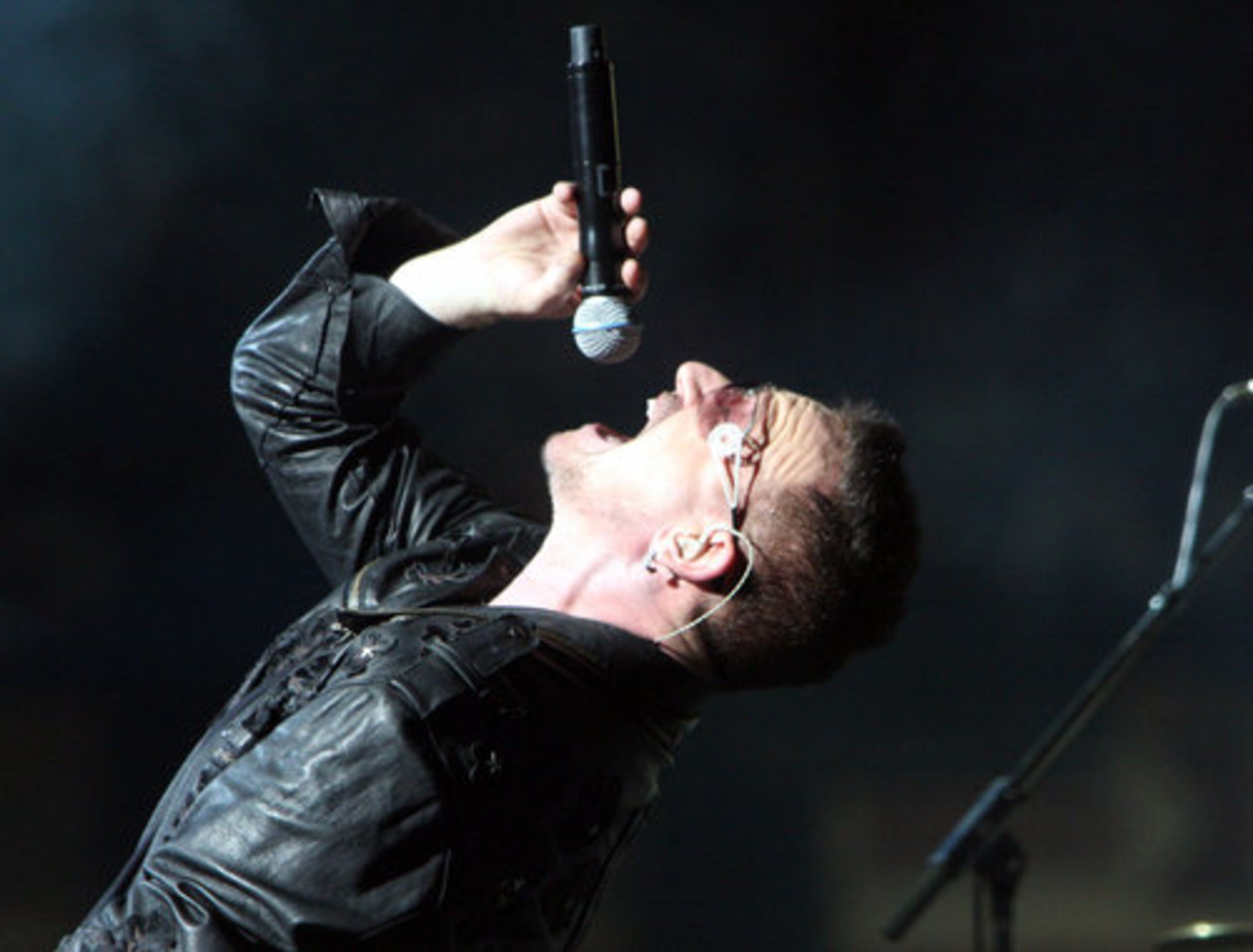 Bono sings "Mysterious Ways".