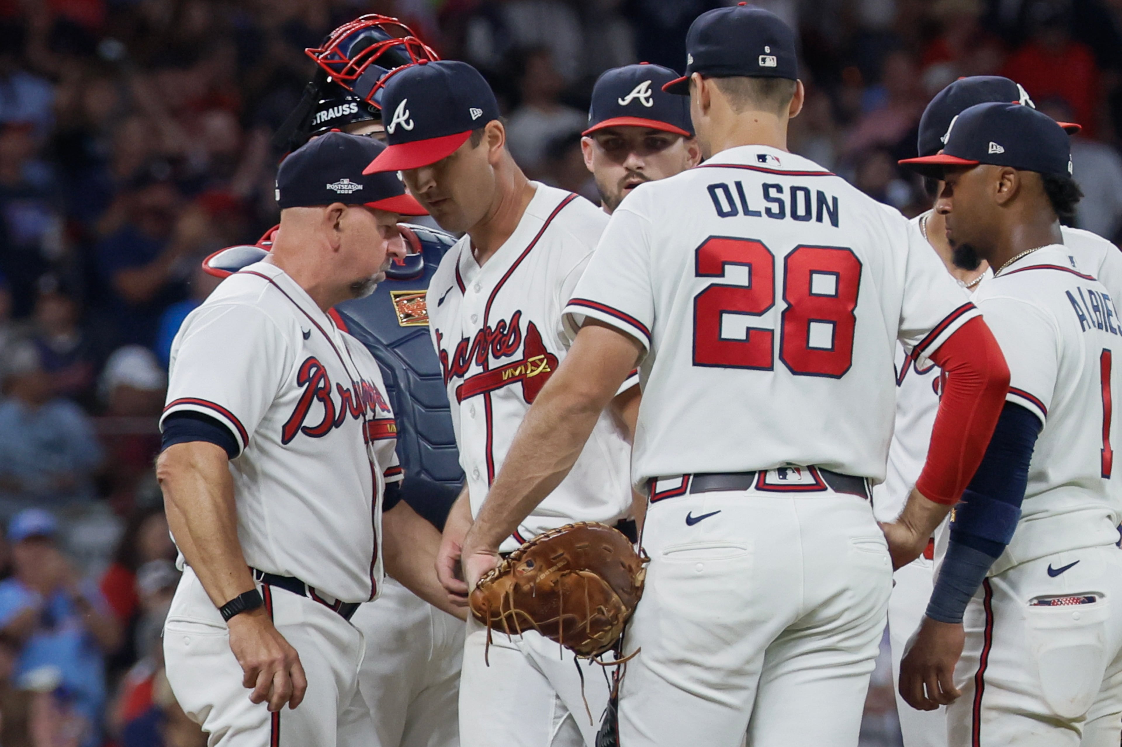 Atlanta Braves pitcher Tyler Mahle, center, is relieved by manager Walt Weiss, left, during the seventh inning of Game 4 of the MLB National League Division Series between the Atlanta Braves and the Los Angeles Dodgers, Wednesday, Oct. 7, 2026, in Atlanta. (Miguel Martinez/AJC)
