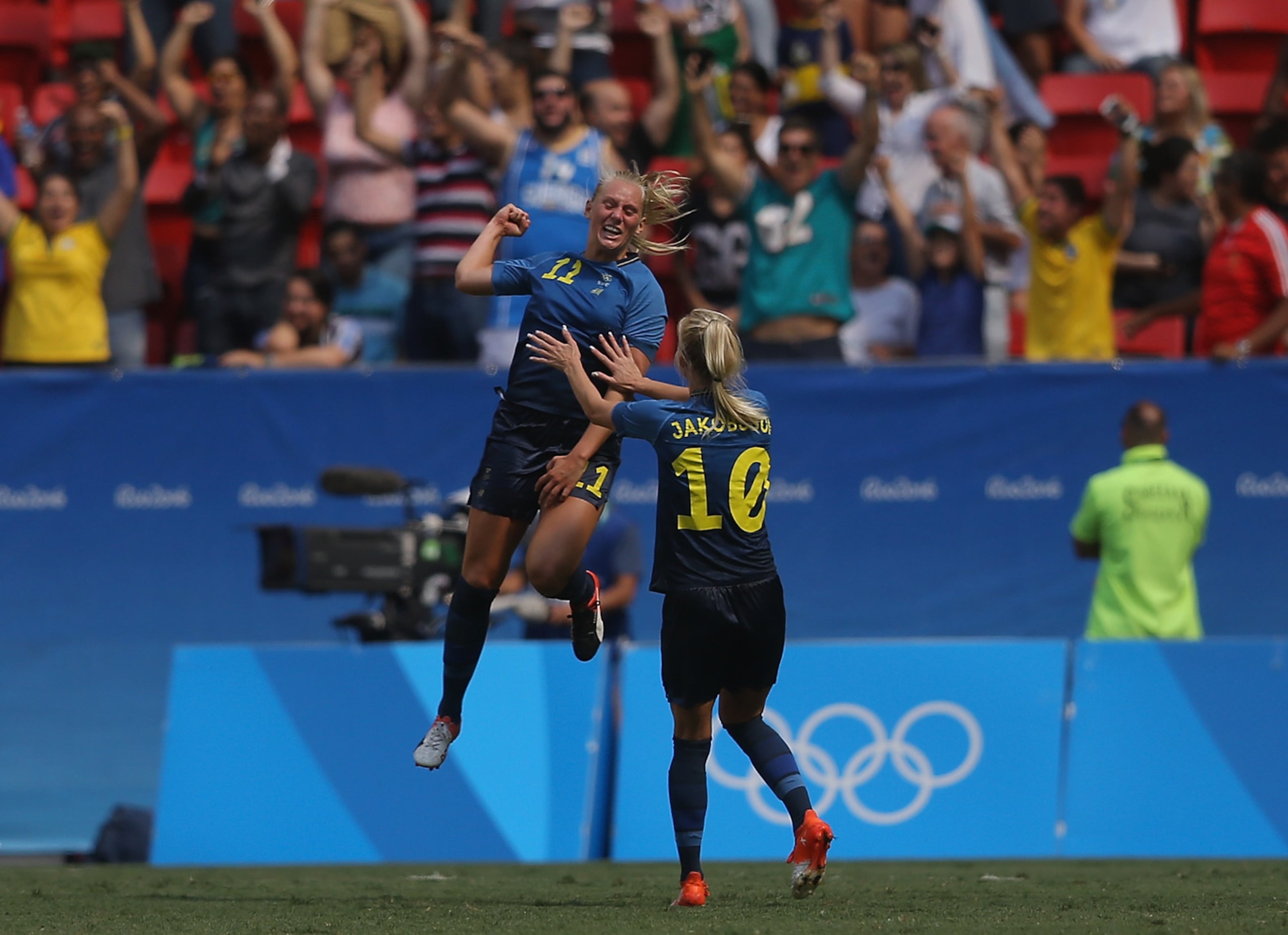 BRASILIA, BRAZIL - AUGUST 12: Stina Blackstenius #11 of Sweden celebrates her goal with teammate Sofia Jakobsson #10 in the second half against the United States during the Women's Football Quarterfinal match at Mane Garrincha Stadium on Day 7 of the Rio 2016 Olympic Games on August 12, 2016 in Brasilia, Brazil. (Photo by Celso Junior/Getty Images)