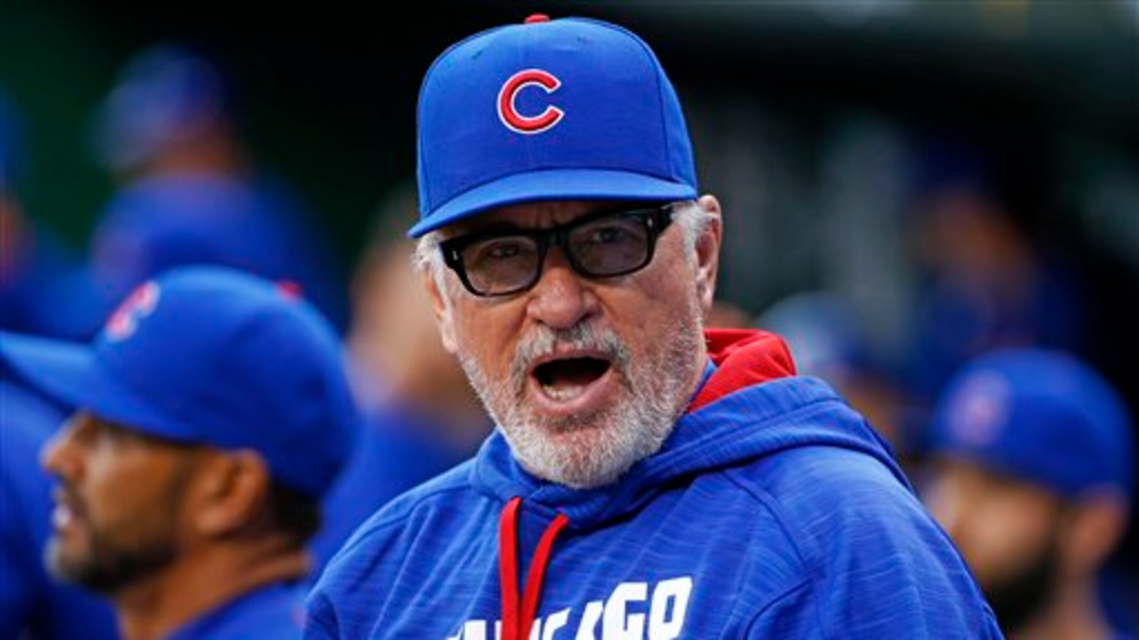Chicago Cubs manager Joe Maddon stands in the dugout before a baseball game against the Pittsburgh Pirates in Pittsburgh, Tuesday, May 3, 2016. (AP Photo/Gene J. Puskar)