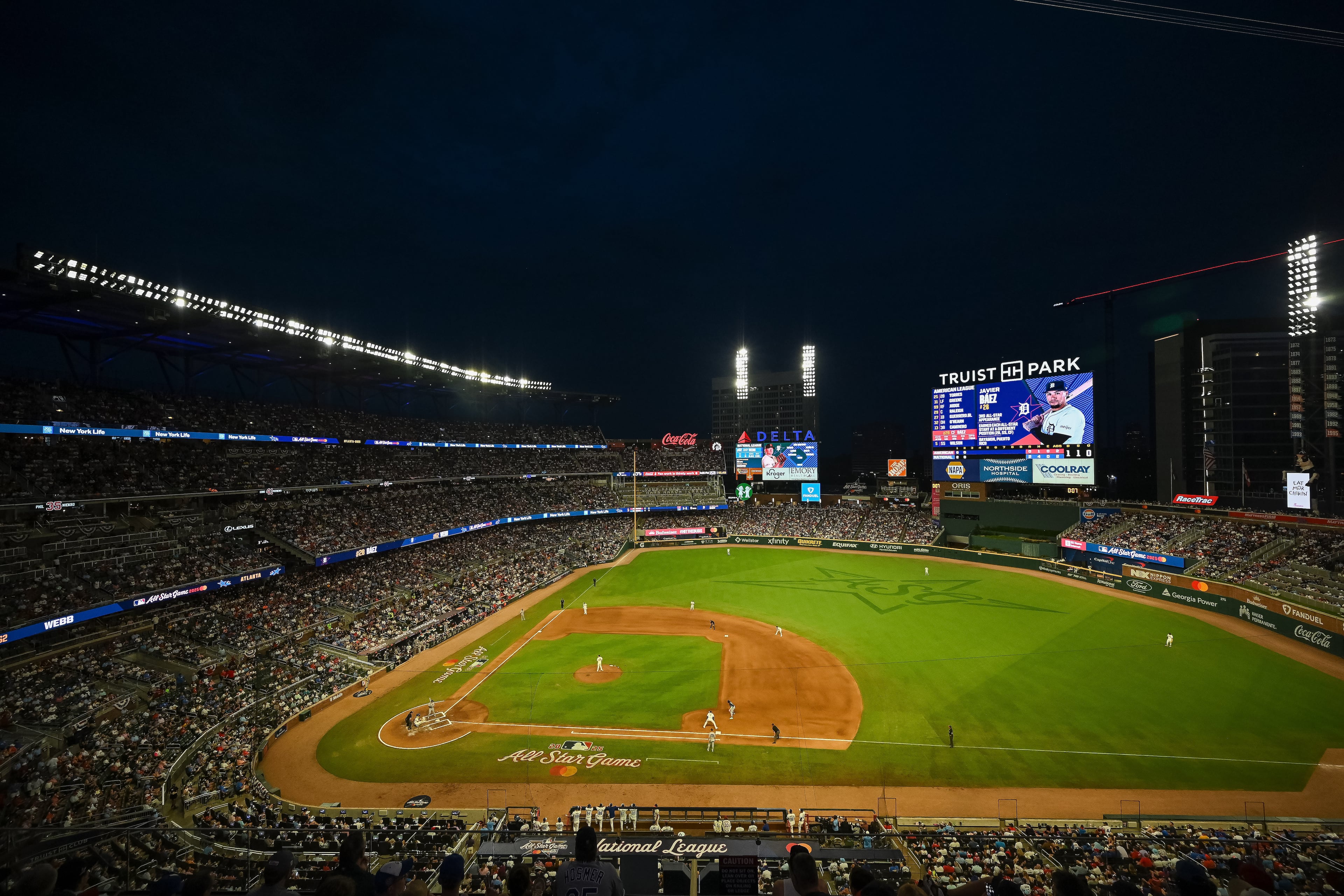 Night falls during the third inning of the MLB All-Star Game at Truist Park in Atlanta on Tuesday, July 15, 2025. (Hyosub Shin/AJC)