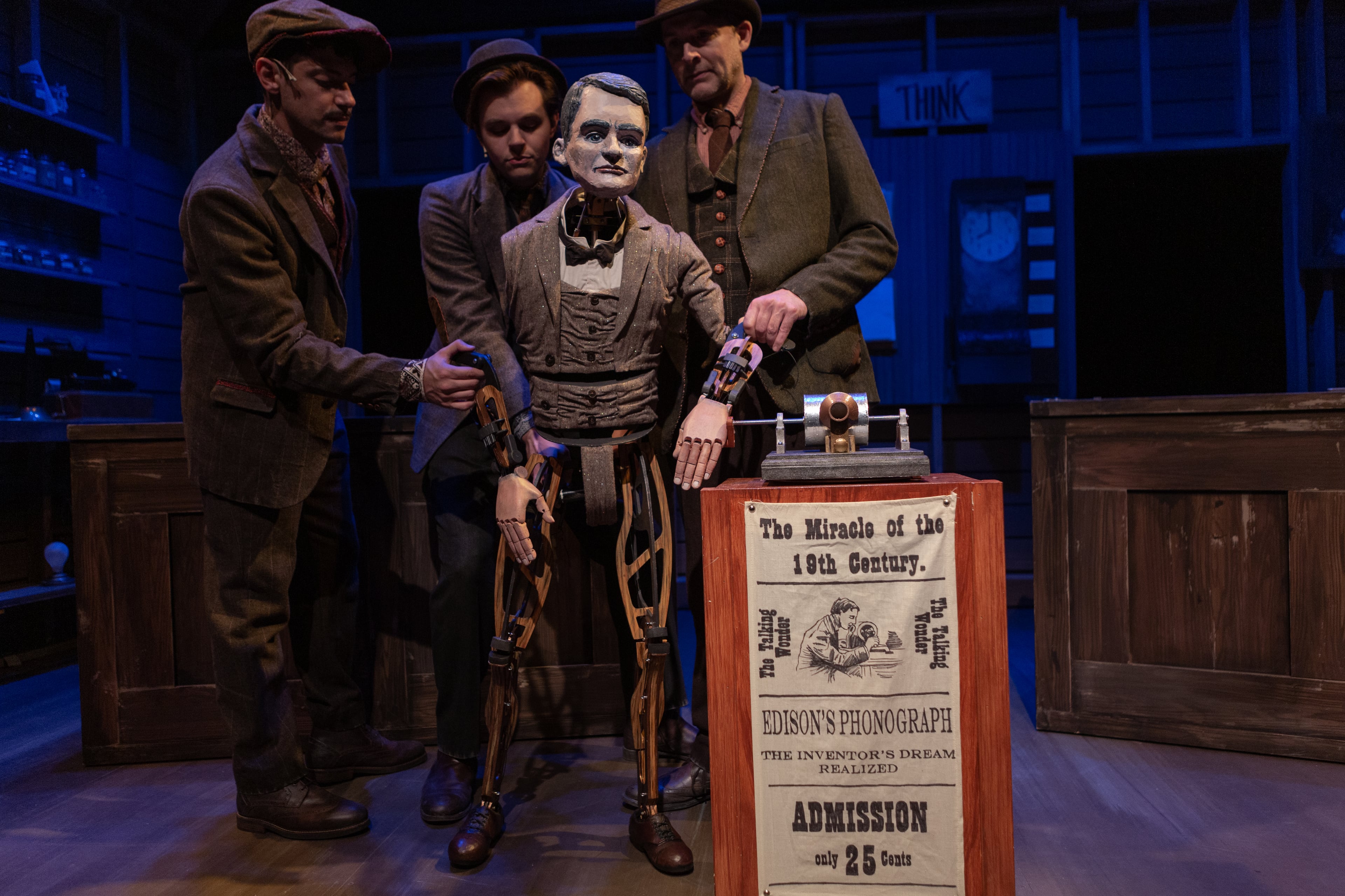 Edison, puppeteered by Krakovsky, from left, Burnette and Hines in 2023, displays his phonograph invention. (Photo courtesy of Center for Puppetry Arts/Stacey Bode)