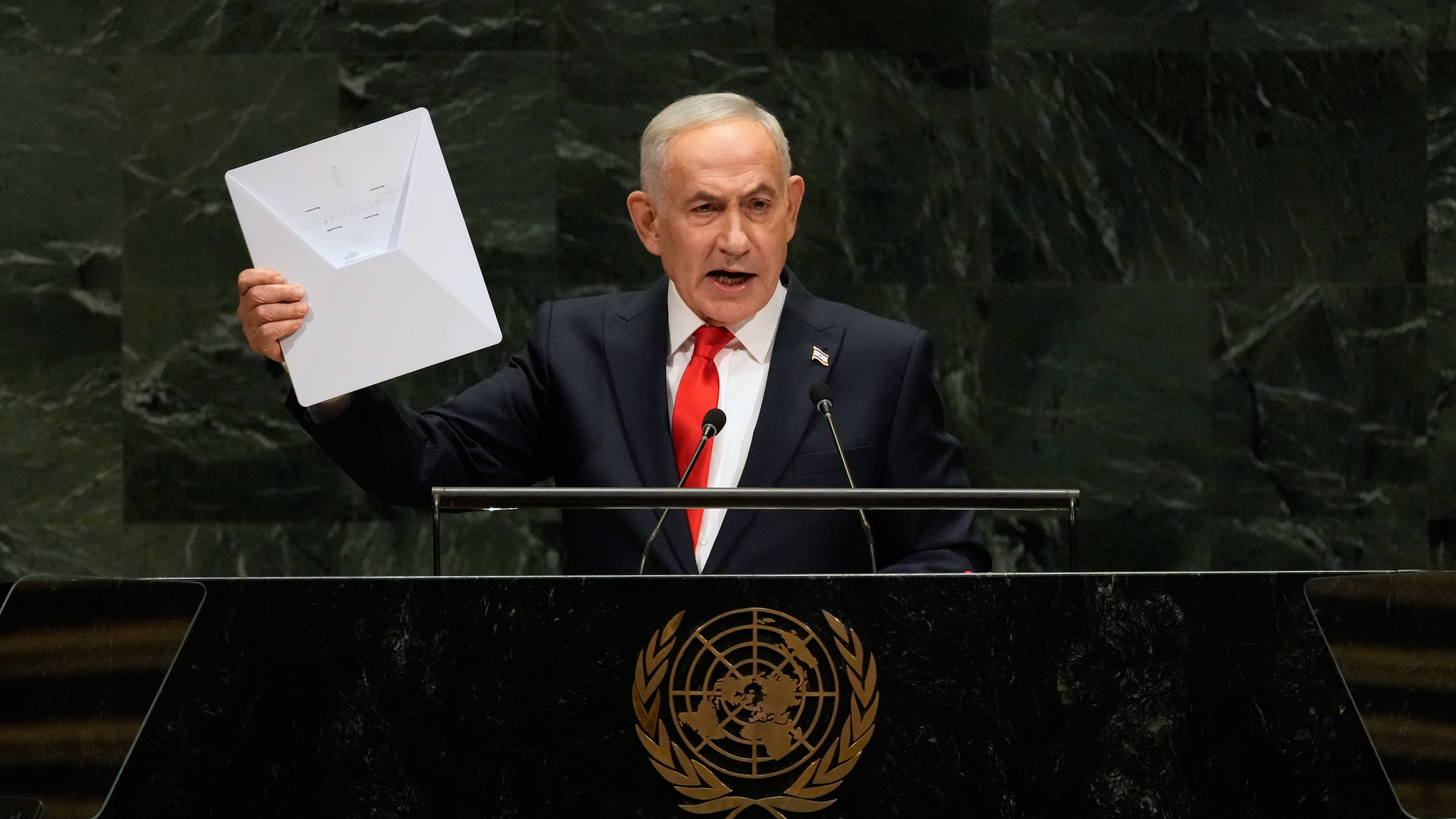 Israeli Prime Minister Benjamin Netanyahu holds up a Starlink satellite internet dish a he speaks during the 81st session of the United Nations General Assembly at United Nations headquarters, Thursday, Sept. 24, 2026. (AP Photo/Seth Wenig)