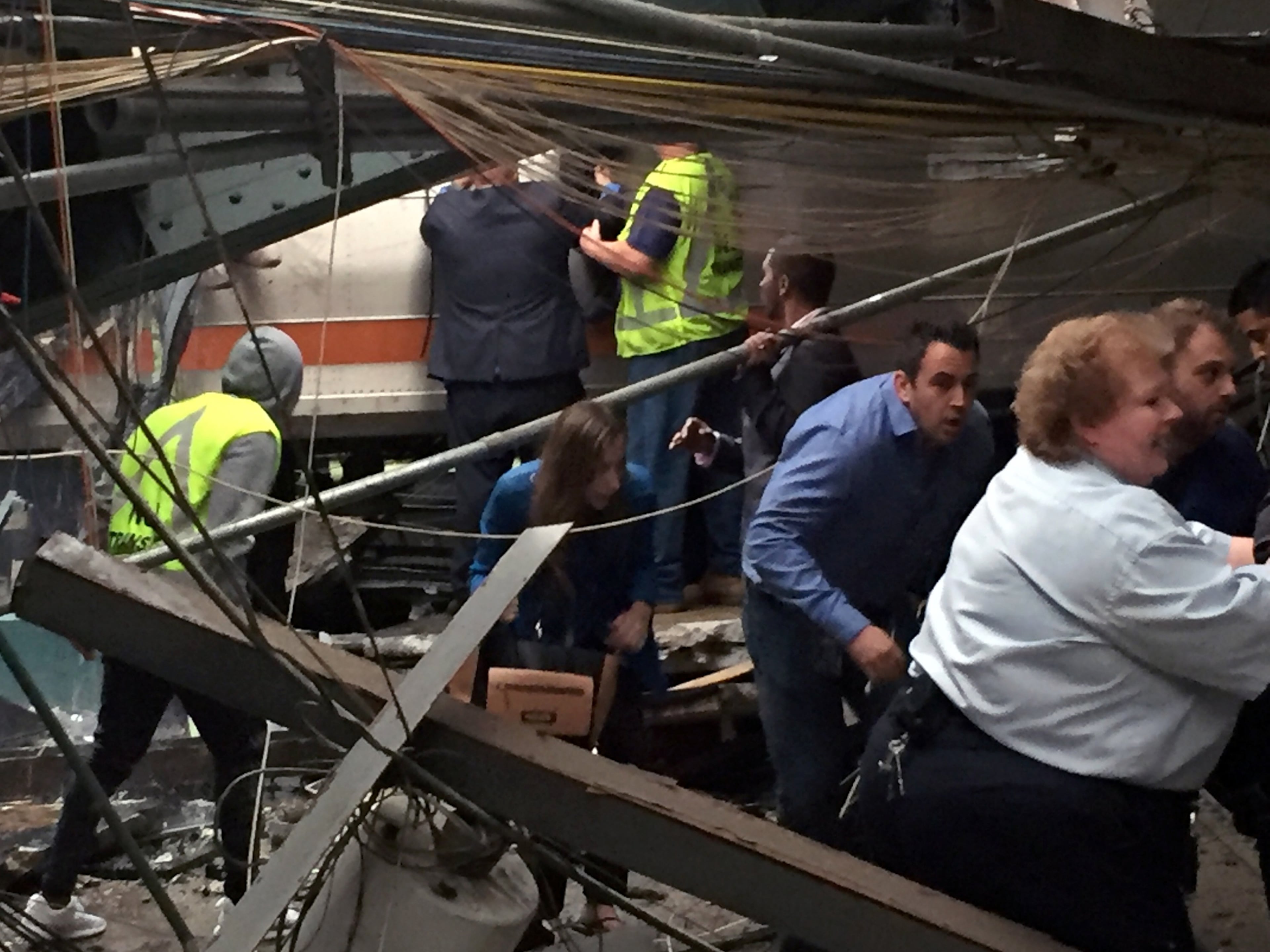 HOBOKEN, NJ - SEPTEMBER 29: Passengers rush to safety after a NJ Transit train crashed in to the platform at the Hoboken Terminal September 29, 2016 in Hoboken, New Jersey. (Photo by Pancho Bernasconi/Getty Images)
