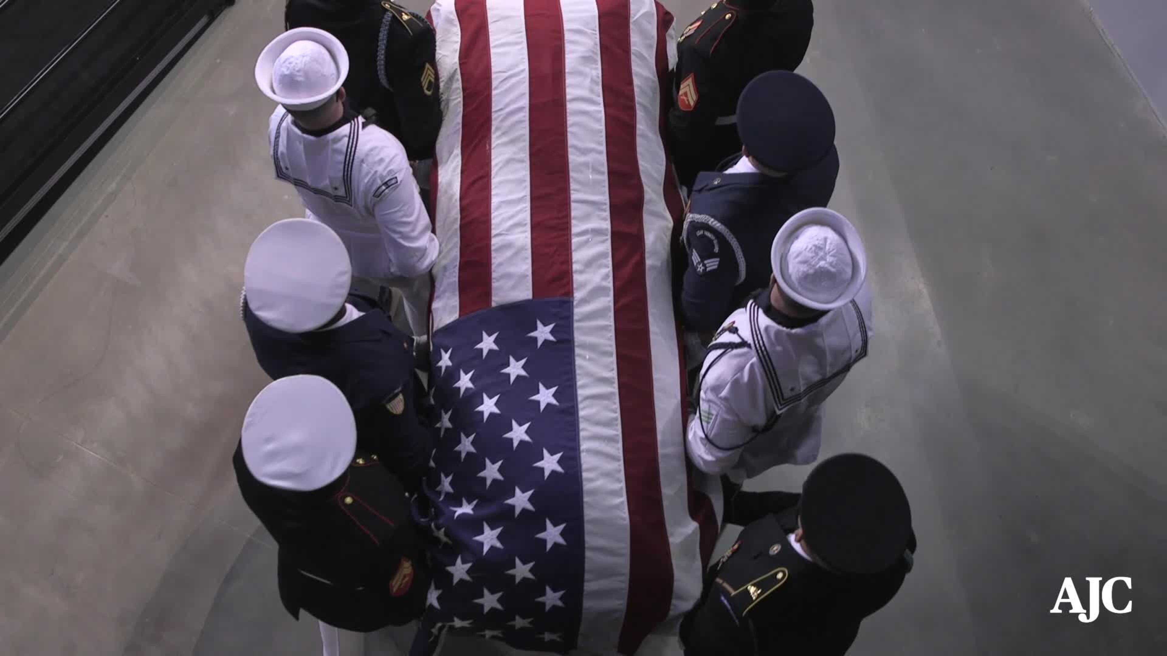 Congressman John Lewis' casket escorted in to Troy University for the first event honoring his historic life, July 25, 2020. (Ryon Horne / Ryon.Horne@ajc.com)