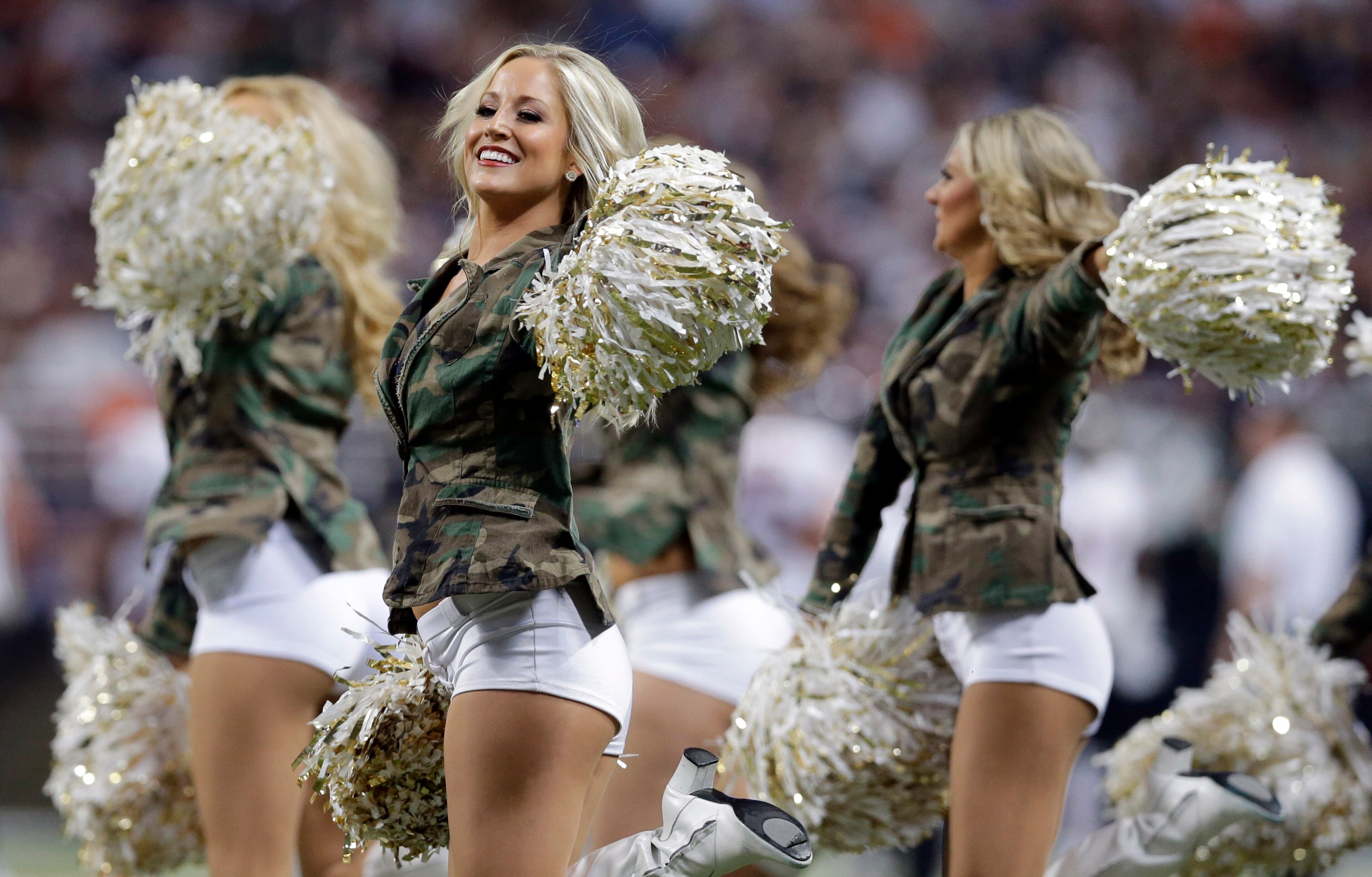 St. Louis Rams cheerleaders perform during the first quarter of an NFL football game between the St. Louis Rams and the Chicago Bears on Sunday, Nov. 24, 2013, in St. Louis. (AP Photo/Nam Y. Huh)