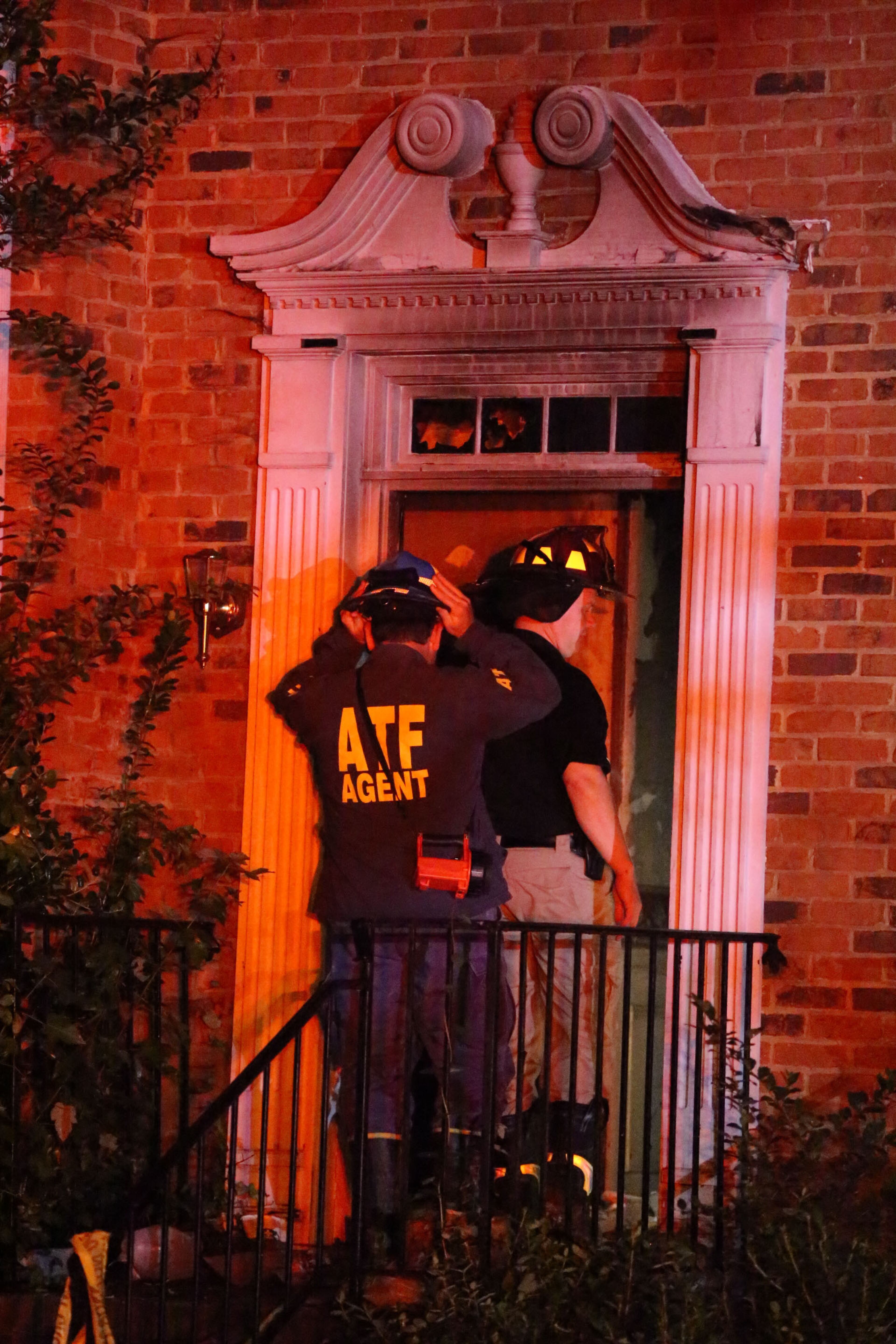 Two people died early Monday after being pulled from a burning home in Sandy Springs. The fire broke out around midnight in a duplex on North River Parkway. | JOHN SPINK/jspink@ajc.om