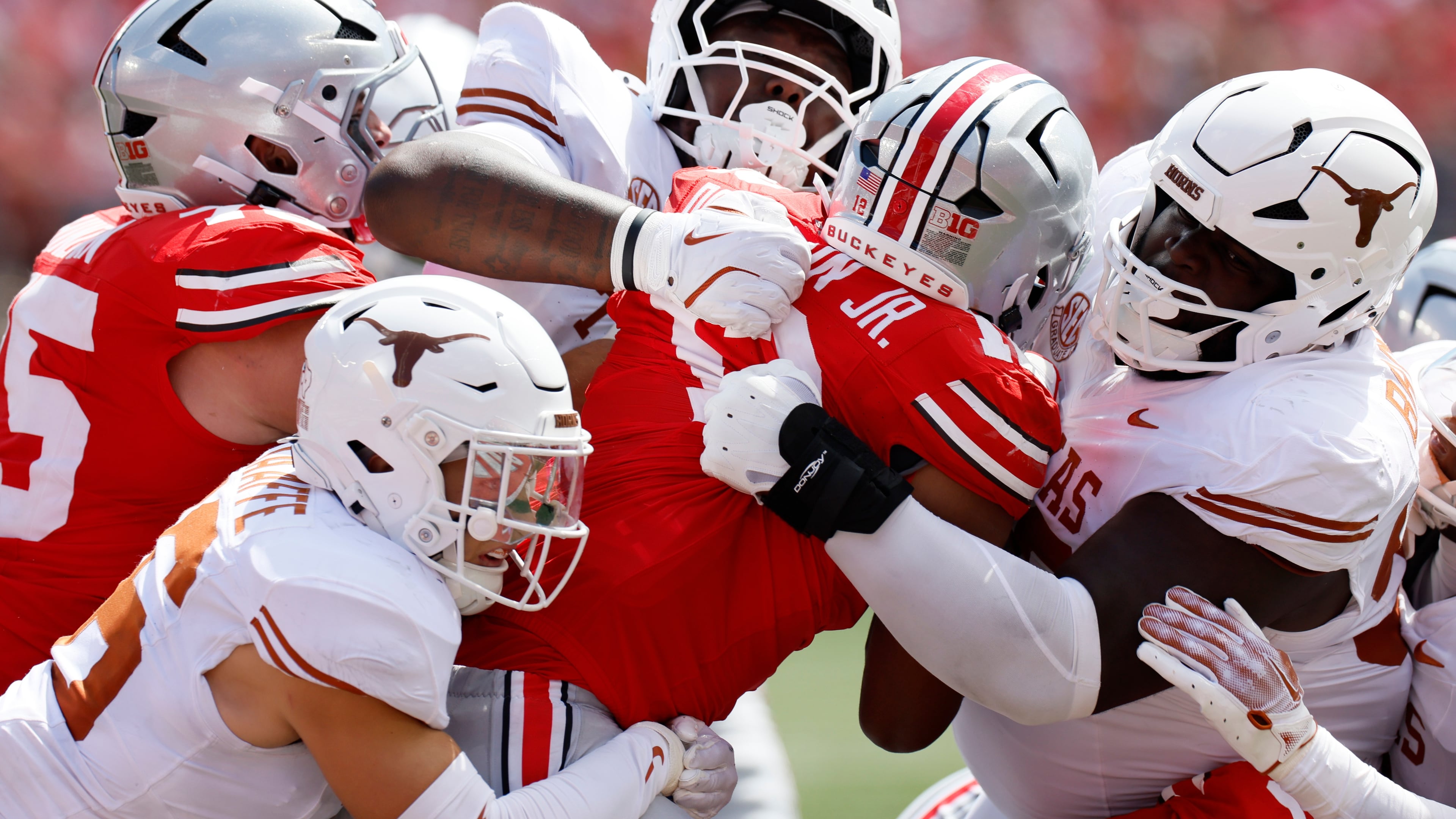 FILE - Ohio State running back CJ Donaldson is stopped by the Texas defense during the second half of an NCAA college football game in Columbus, Ohio., Aug. 30, 2025. (AP Photo/Jay LaPrete, File)