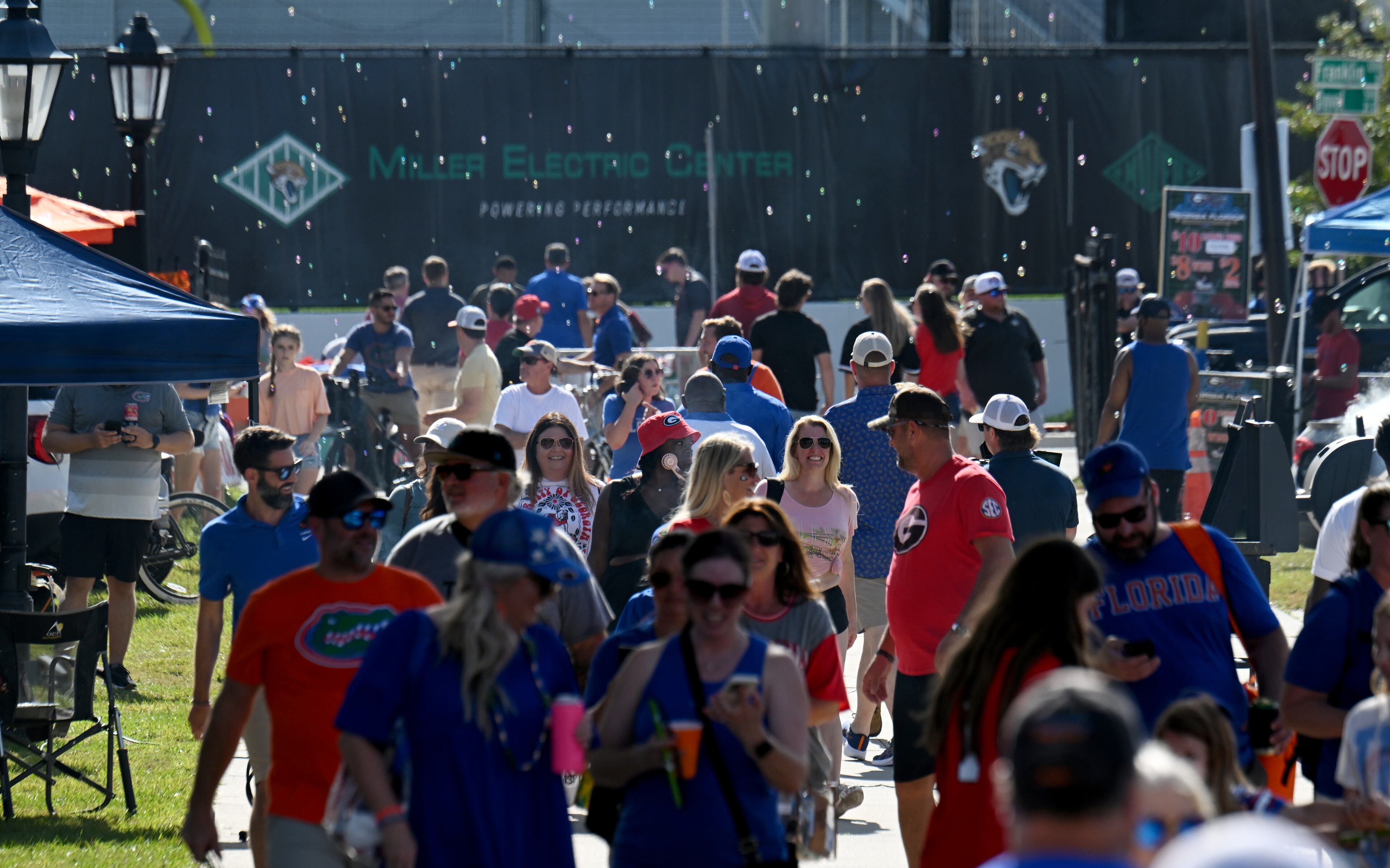 Football fans enjoy tailgating outside EverBank Stadium ahead of the NCAA football game between Georgia and Florida, Saturday, November 2, 2024, in Jacksonville, Fla. (Hyosub Shin / AJC)
