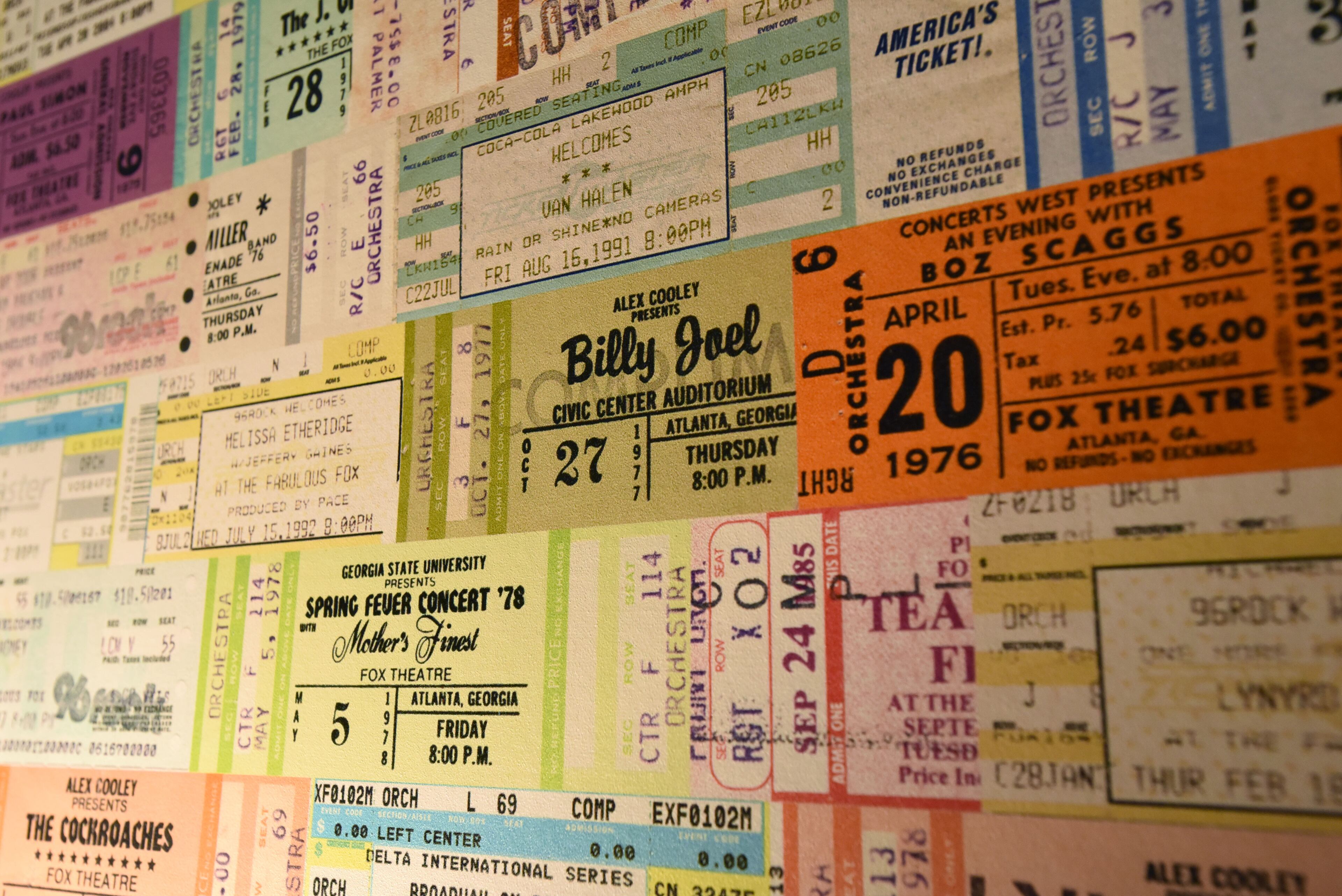 Ticket stubs from more than 40 years of shows at the Fox Theatre in Atlanta adorn a wall of a dressing room in the theater. HYOSUB SHIN / HSHIN@AJC.COM