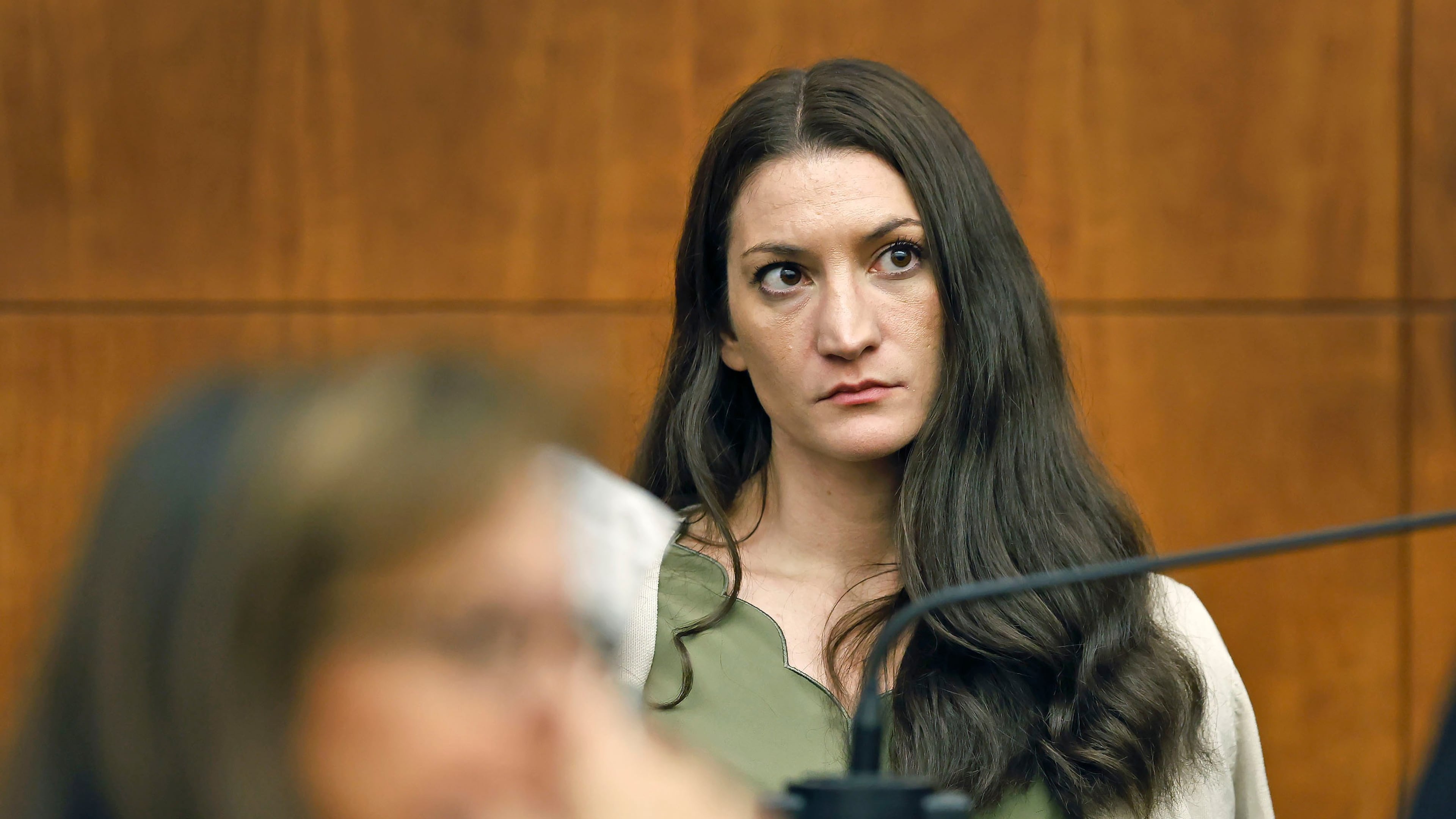 Lindsay Clancy waits for the judge to call a prospective jury member into court in her murder trial where she is charged in the 2023 killing of her three children, Wednesday, July 22, 2026, in Plymouth Superior Court in Plymouth, Mass. (Greg Derr/The Patriot Ledger via AP, Pool)