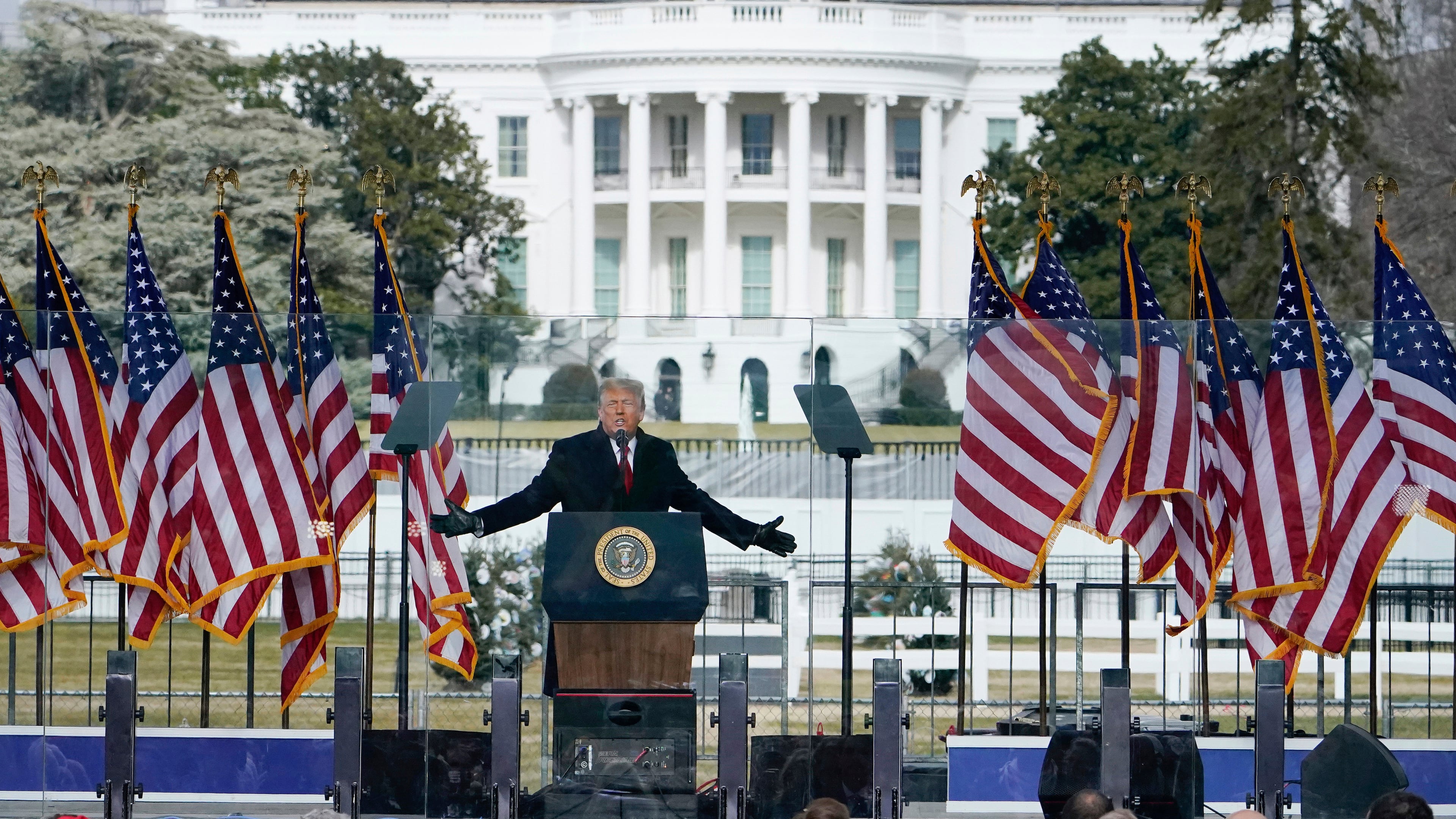FILE - With the White House in the background, President Donald Trump speaks at a rally on Jan. 6, 2021, in Washington. (AP Photo/Jacquelyn Martin, file)