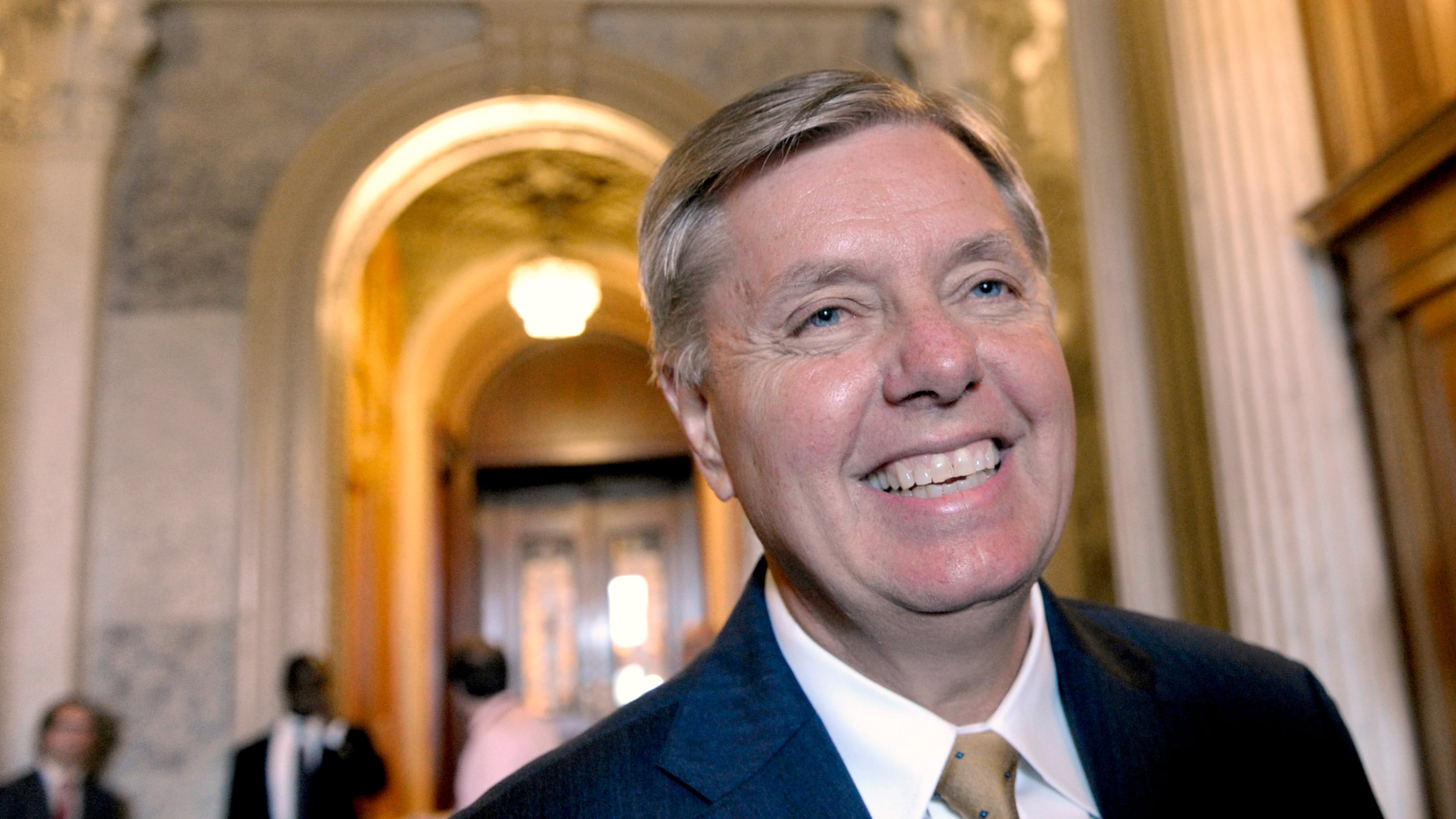 FILE - Sen. Lindsey Graham, R-S.C., speak with reporters following a vote on student loans on Capitol Hill in Washington, May 8, 2012. (AP Photo/Susan Walsh, File)