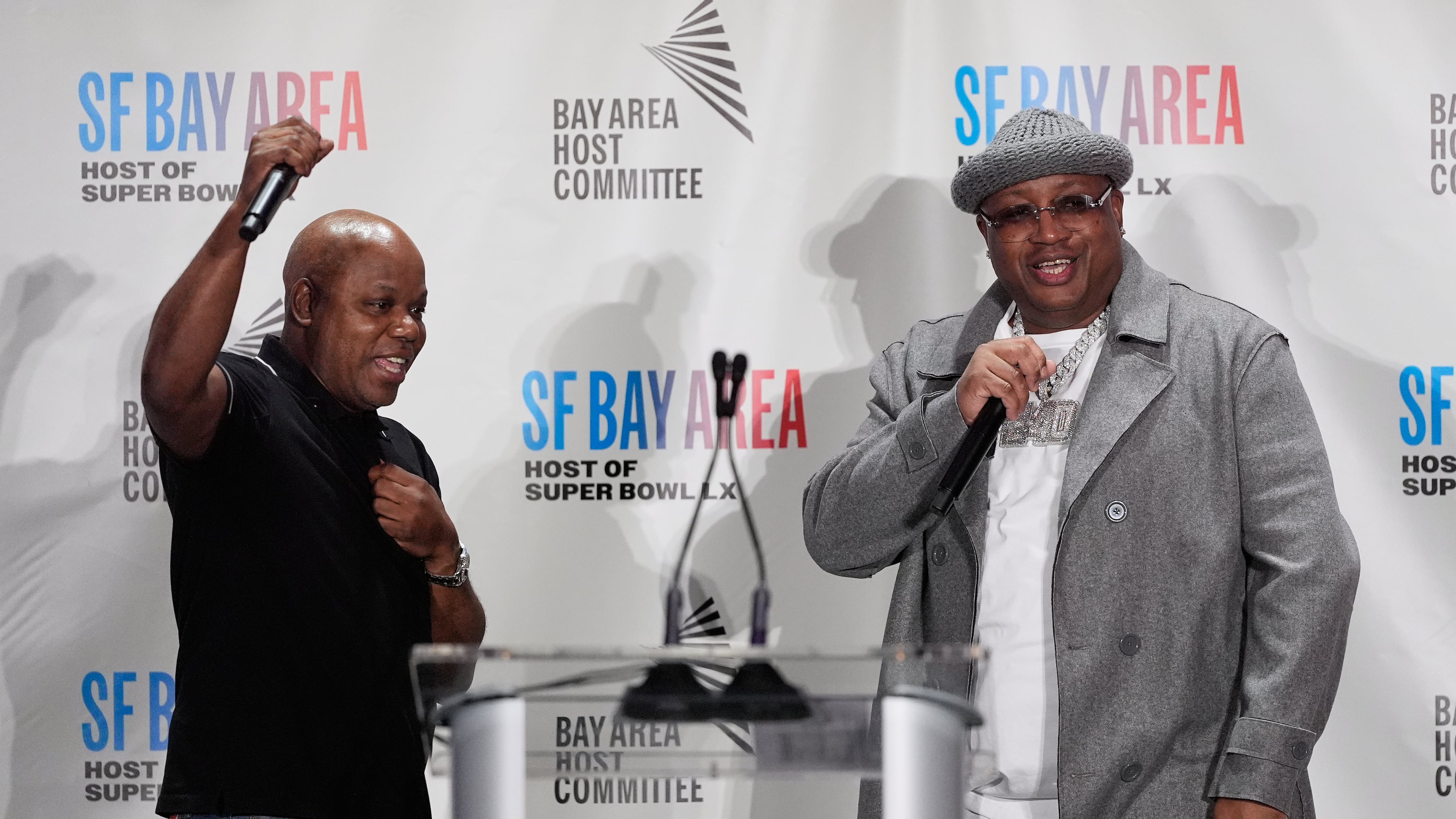 Rappers Too Short, left, and E-40 speak during a Bay Area Host Committee news conference for the NFL Super Bowl football game in San Francisco, Monday, Feb. 2, 2026. (AP Photo/Jeff Chiu)