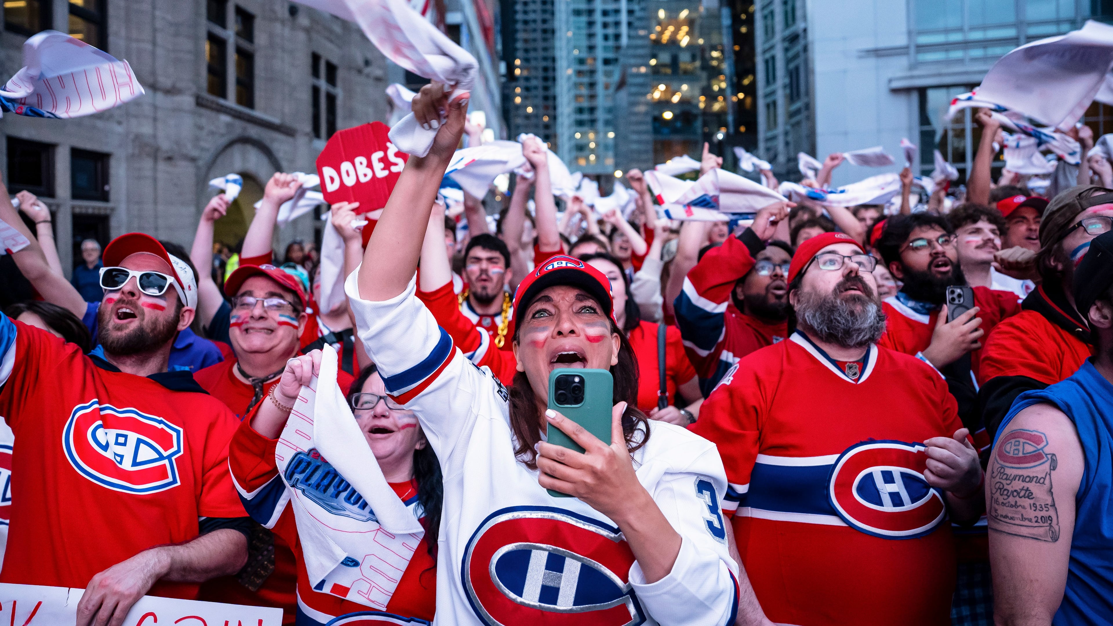 Fans cheer on the Montreal Canadiens during first period NHL playoff hockey game between the Montreal Canadiens and the Carolina Hurricanes in Montreal on Wednesday, May 27, 2026. (Christopher Katsarov/The Canadian Press via AP)