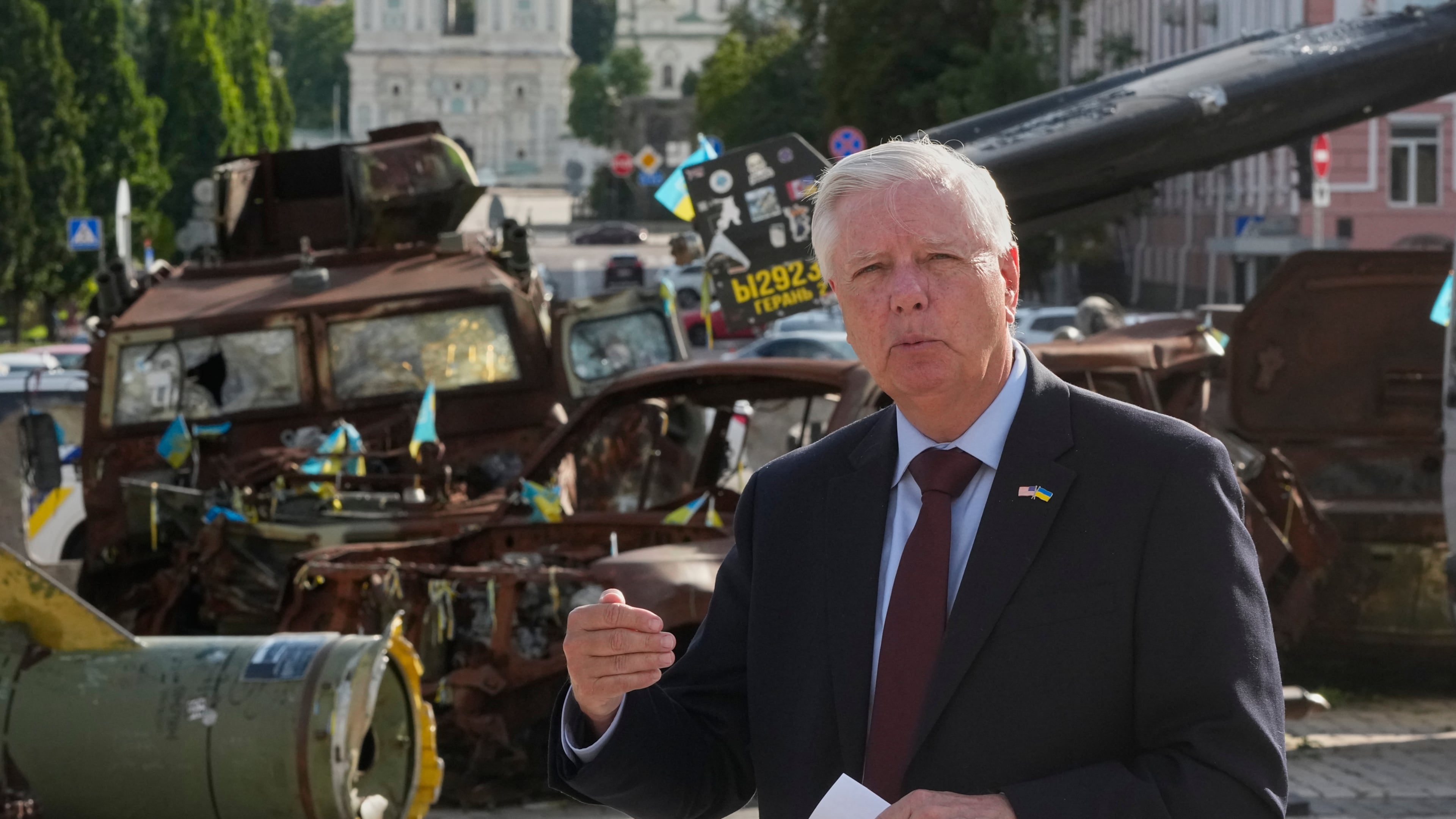FILE - U.S. Sen. Lindsey Graham, R-S.C. answer media questions near damaged Russian vehicles exhibition in central Kyiv, on July 10, 2026. (AP Photo/Efrem Lukatsky, File)