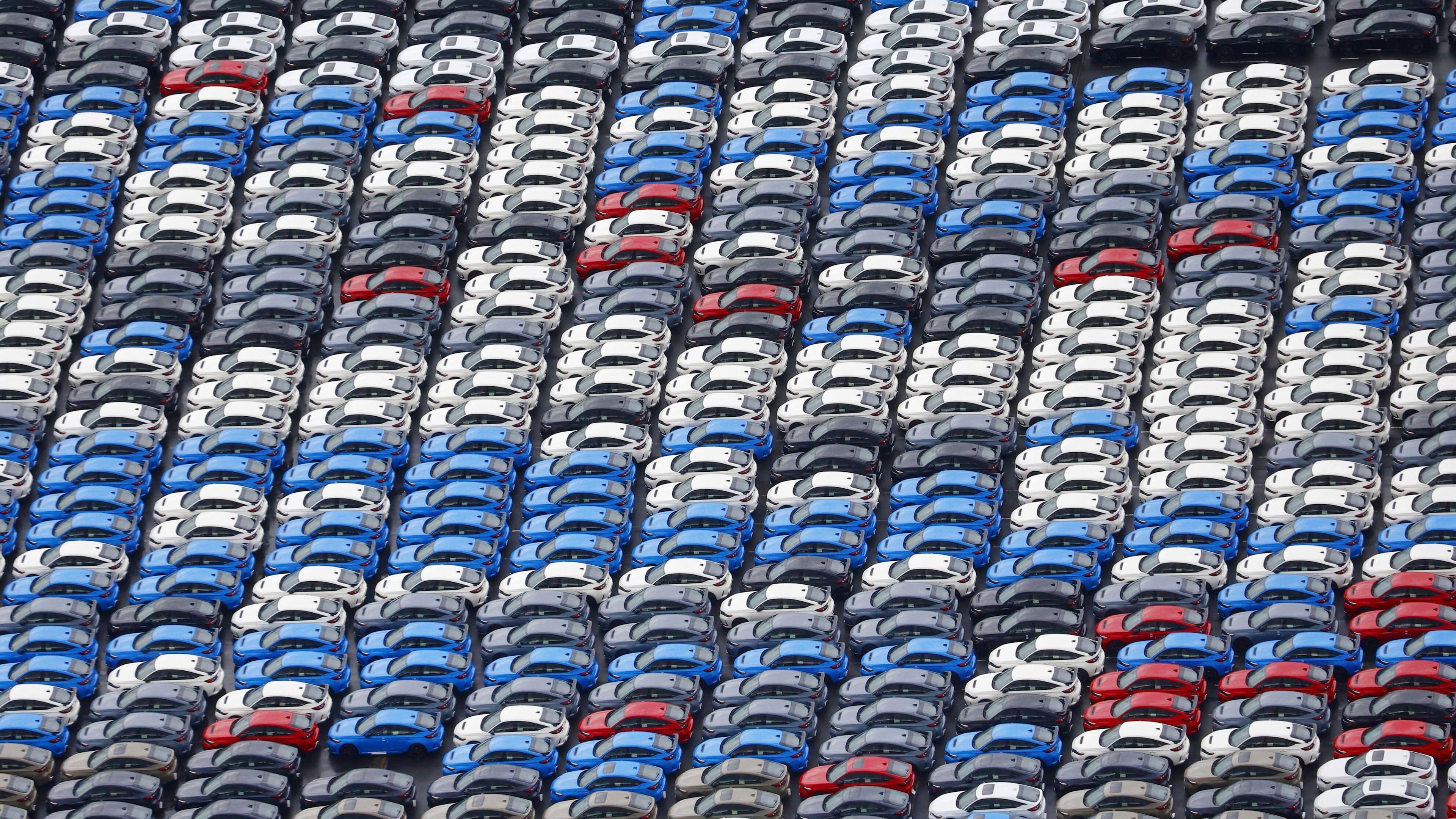 FILE - Vehicles are parked for export at a Yokohama port, near Tokyo on Aug. 1, 2025. (Takuto Kaneko/Kyodo News via AP, File)