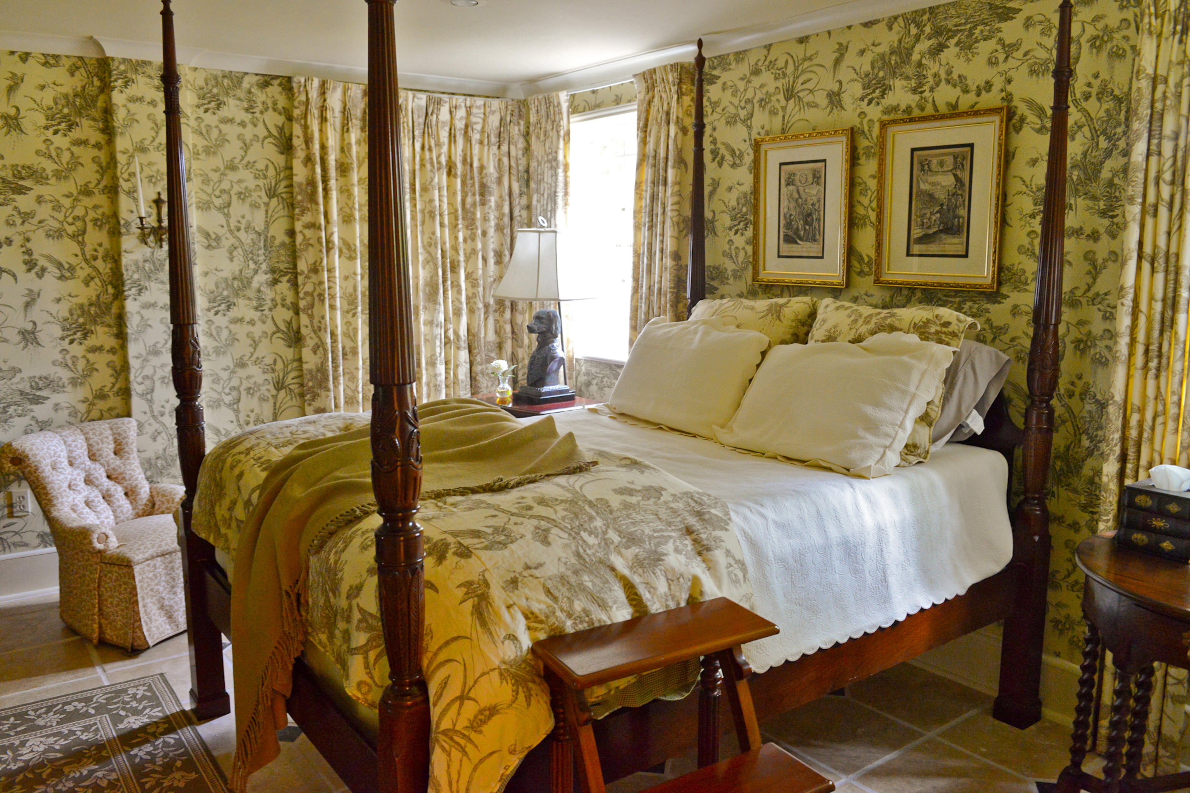A guest bedroom on the terrace garden level is decorated in botanical wall draperies, bed linens and wallcoverings from French company Zuber & Cie. It's a sanctuary for rest, meditation and relaxation.