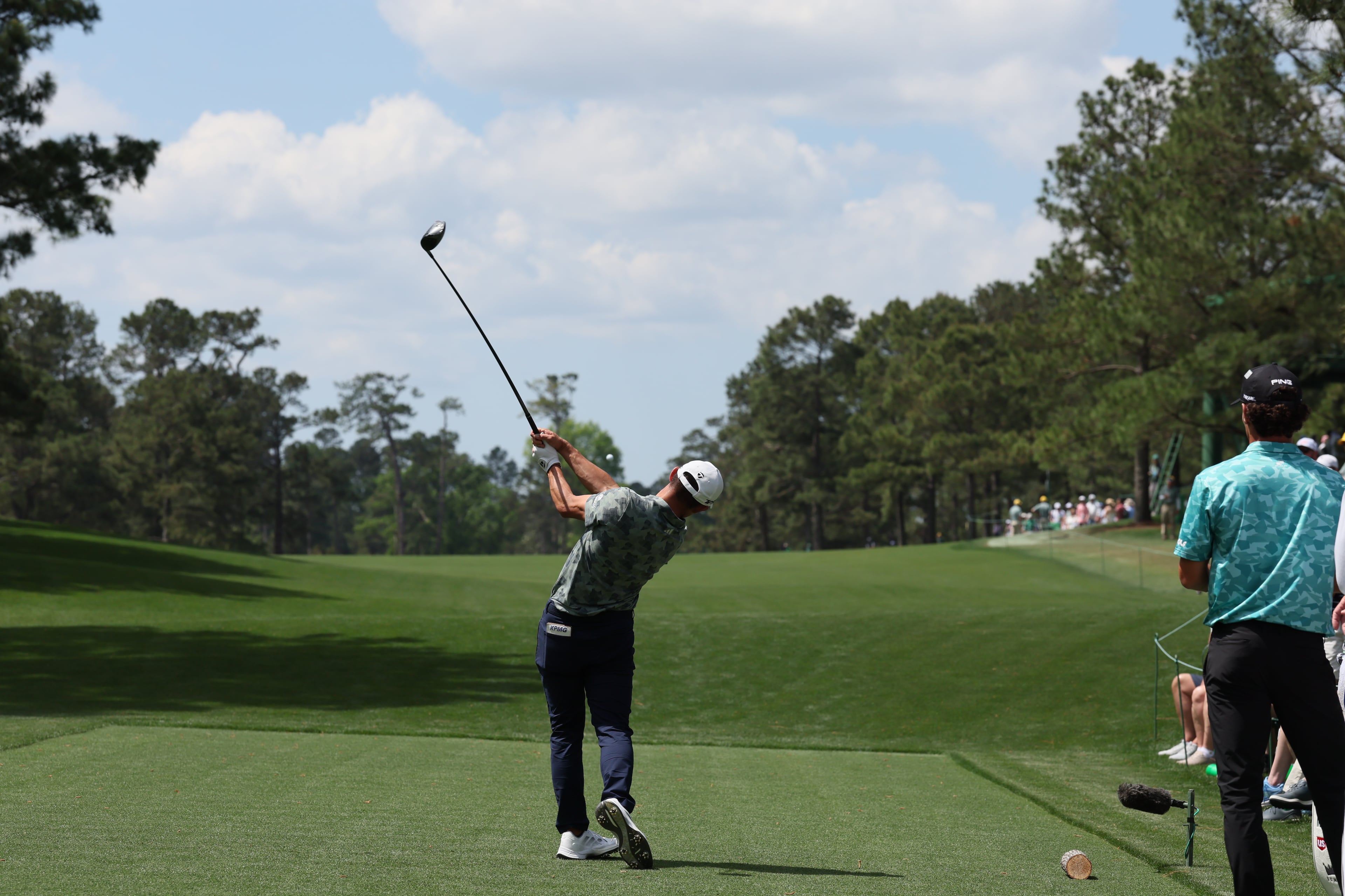 Collin Morikawa tees off from 15th tee during first round of the Masters golf tournament, at Augusta National Golf Club, Thursday, April 10, 2025, in Augusta, Ga. (Jason Getz / AJC)
