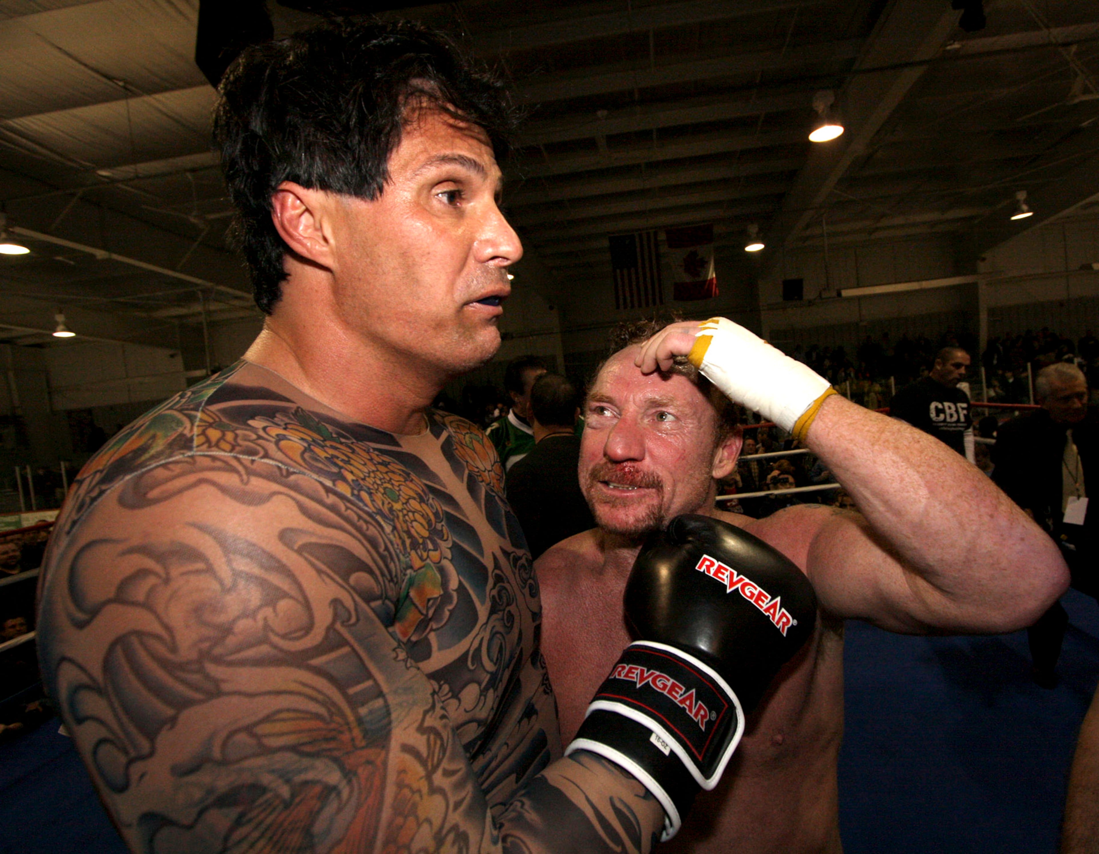 Danny Bonaduce, right, congratulates former baseball palyer Jose Canseco following their celebrity boxing match Saturday, Jan. 24, 2009, in Aston Pa.