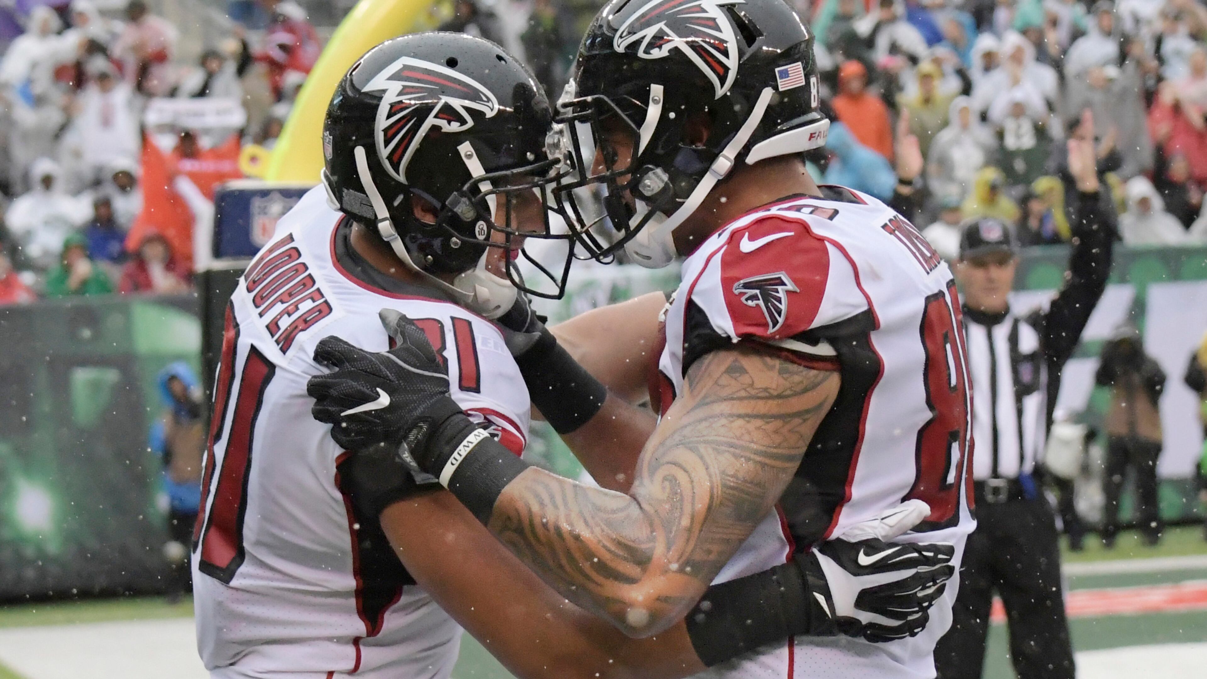 Atlanta Falcons tight end Austin Hooper (81) celebrates after scoring a touchdown with Levine Toilolo (80) during the first half of an NFL football game against the New York Jets Sunday, Oct. 29, 2017, in East Rutherford, N.J. (AP Photo/Bill Kostroun)