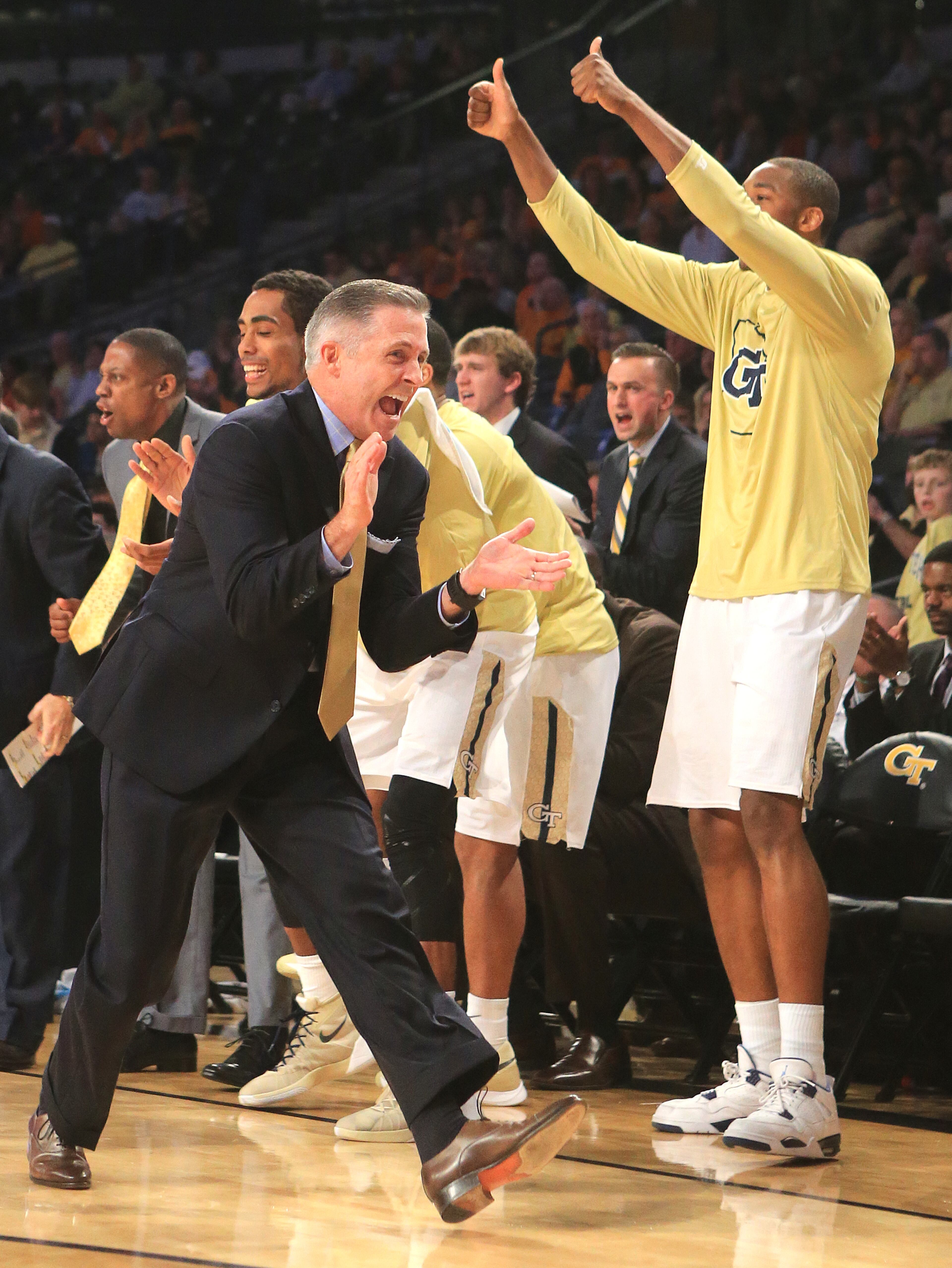 Georgia Tech head coach Brian Gregory and the bench react as the Jackets get a steal against Tennessee during the first half in a basketball game on Monday, Nov. 16, 2015 in Atlanta. Curtis Compton / ccompton@ajc.com